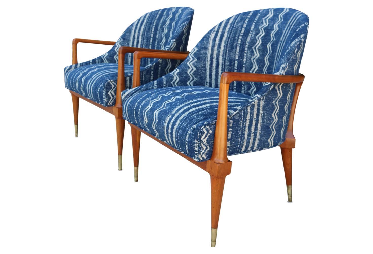 These IB Kofod-Larsen style chairs have been given a new life! Lovingly restored and upholstered in a Shibori inspired fabric, these are a great mash up of Mid-Century and Boho styles! Gorgeous curved wood frame and barrel back seats.
