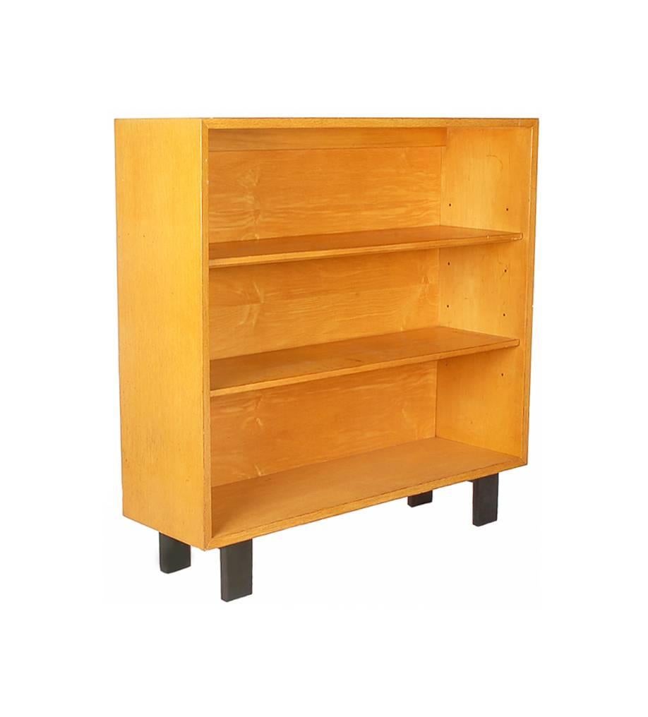 A nice size bookcase designed by George Nelson for Herman Miller. Maple wood construction with ebony legs. (Unmarked).