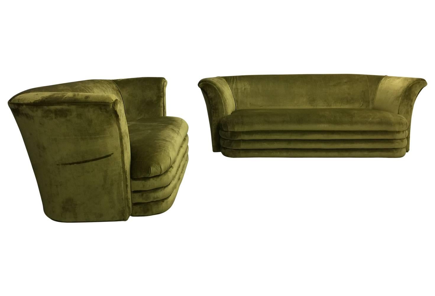 Gorgeous midcentury sofa and loveseat with streamlined moderne Art Deco styling. Lovely chartreuse green crushed velvet upholstery. We'd be happy so sell them individually as well.

Loveseat: 70 wide, 36 deep, 30 tall
Sofa: 82 wide, 36 deep, 30