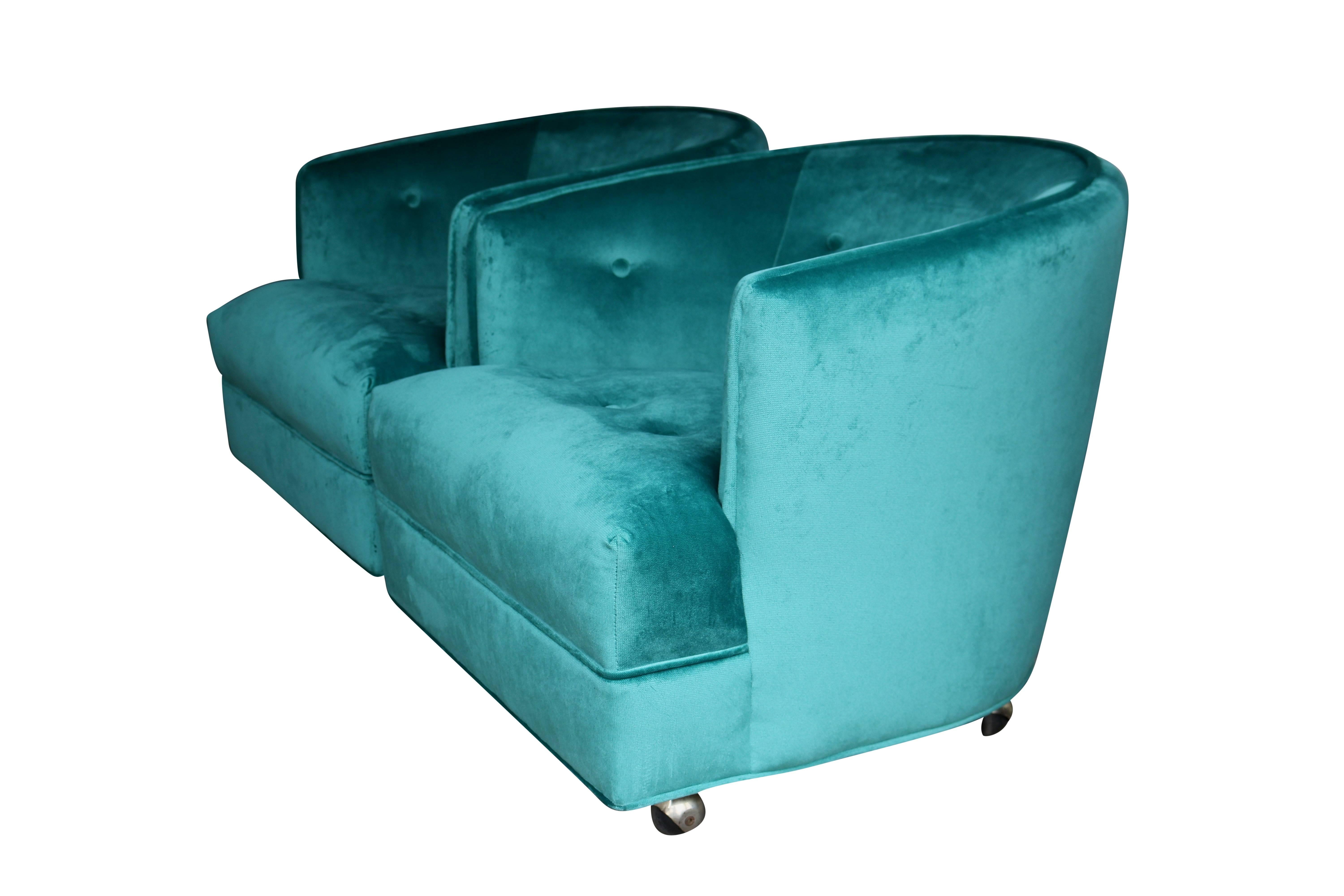 Freshly upholstered in a sensual velvet, these club chairs are comfortable and chic. On casters could easily be swapped out for legs if desired.