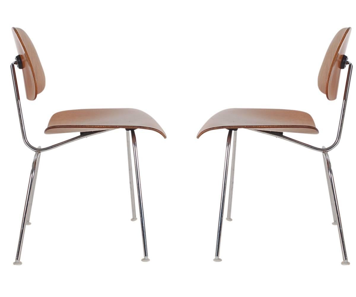 A complete set of six DCM chairs designed by Charles Eames for Herman Miller. They feature molded plywood seats and backs with heavy solid chrome frames. Early 1970s production with labels.