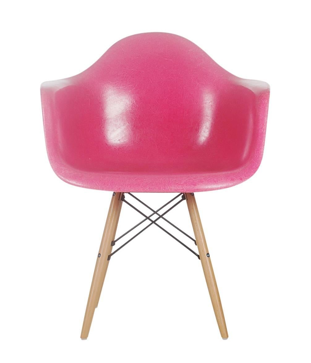 One of the rarest fiberglass colors known to collectors, hot pink. These are vintage originals produce by Herman Miller in the early 1970s. The original pedestal bases are included, or you can upgrade to a reproduction base as shown for a nominal