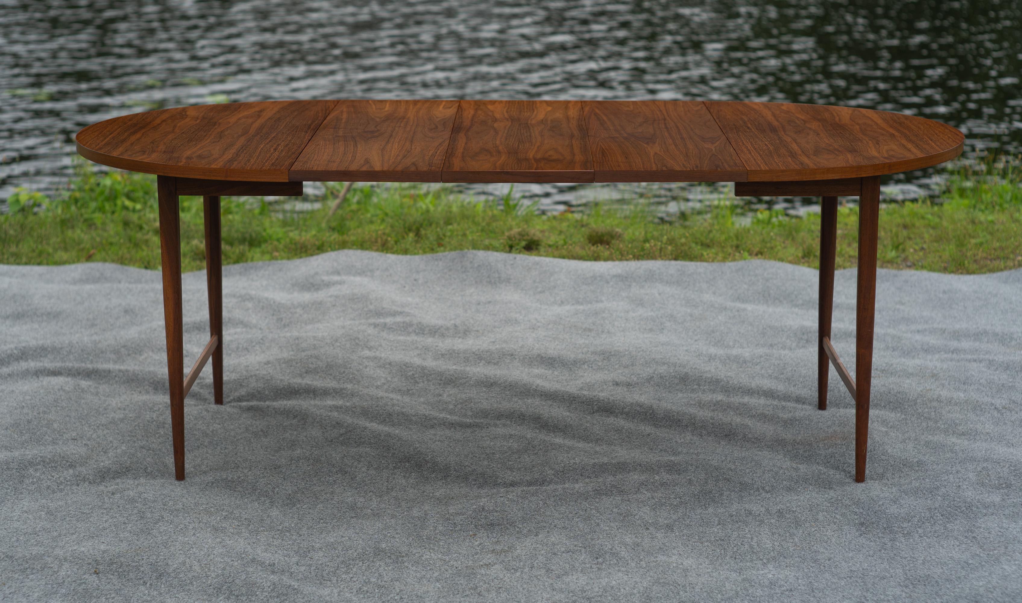 Made here in the USA by Lane Furniture, this table was designed by Paul McCobb, renowned as an extraordinarily prolific American designer. With a 42
