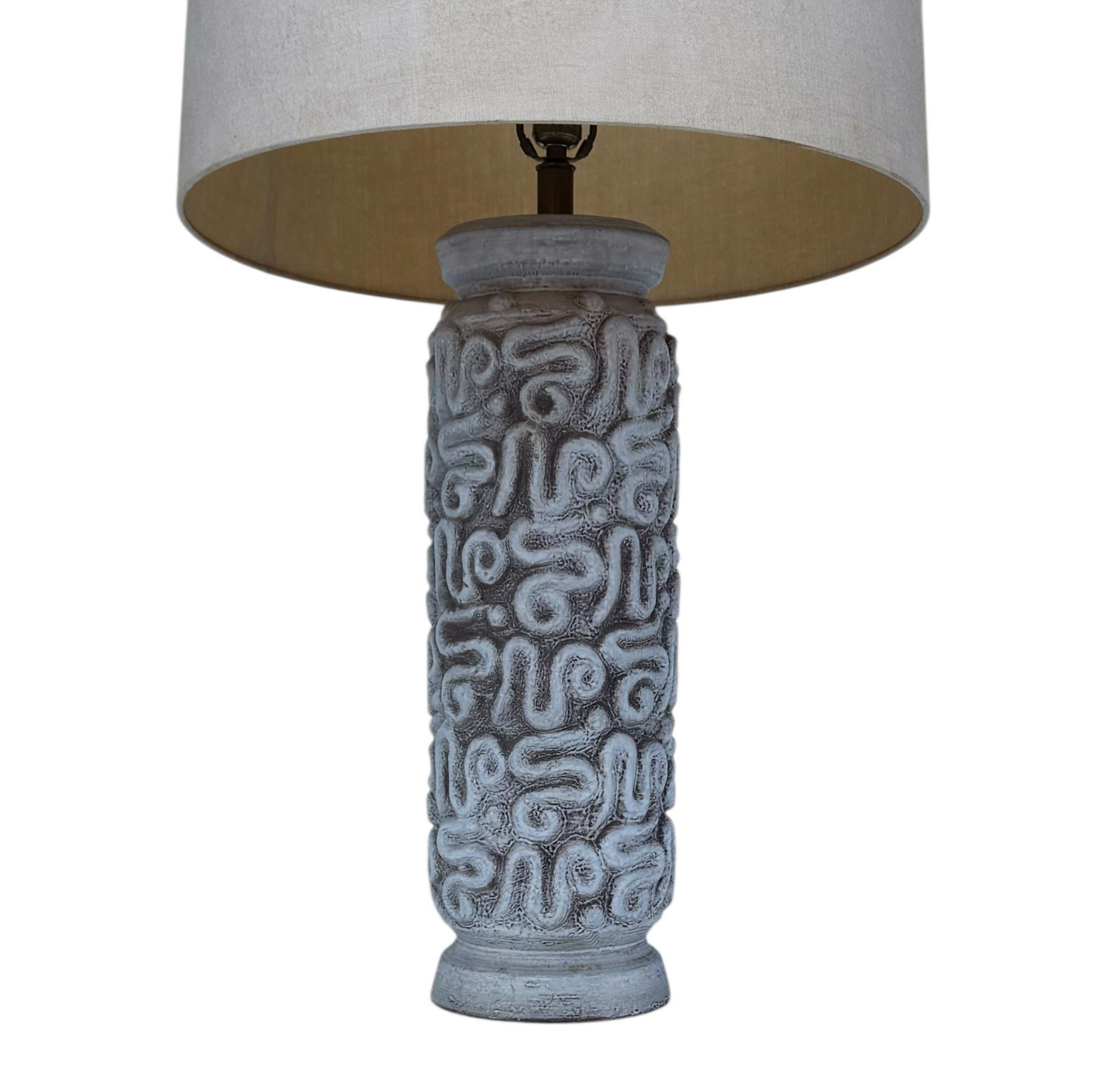 A ceramic Mid-Century Modern table lamp. A beautiful natural gray color palette. Tested, fully working and very well cared for through the years. Shade is not included. 

In the style of: Aldo Londi, Bitossi, Raymour, Rosenthal Netter.
