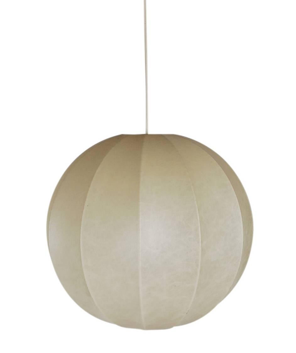 A simple modern beauty designed by Achille and his brother Pier Giacomo Castiglioni. Its made of a very soft skin like plastic stretched over a metal frame. This is the largest size made. Very similar design to the bubble lamp by George Nelson. It