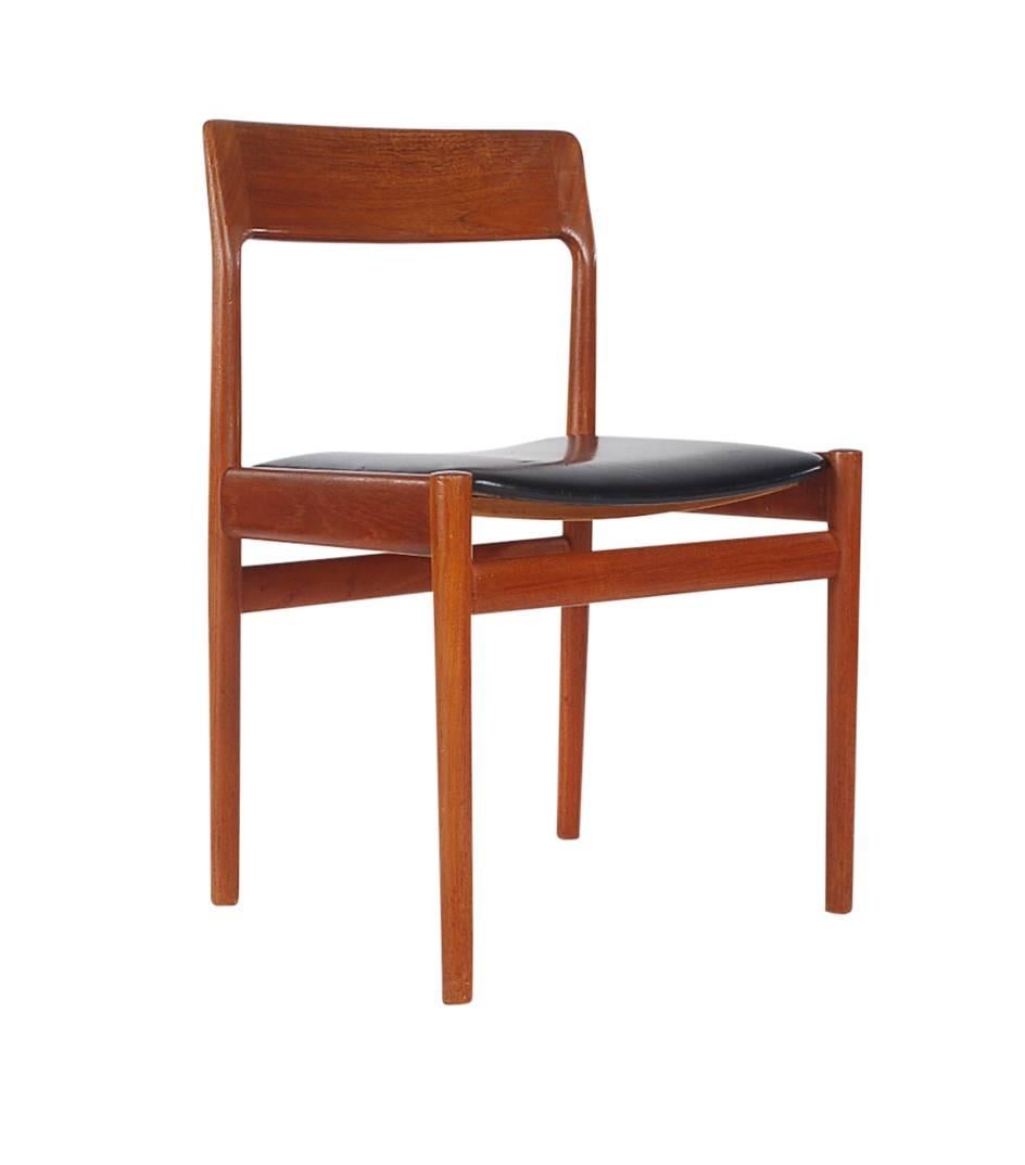A simple yet beautifully made set of dining chairs designed by Johannes Norgaard for Norgaard Mobelfabrik. They feature solid teak frames with black vinyl seat covers. 

In the style of: Niels Moller, Greta Jalk, Arne Vodder.