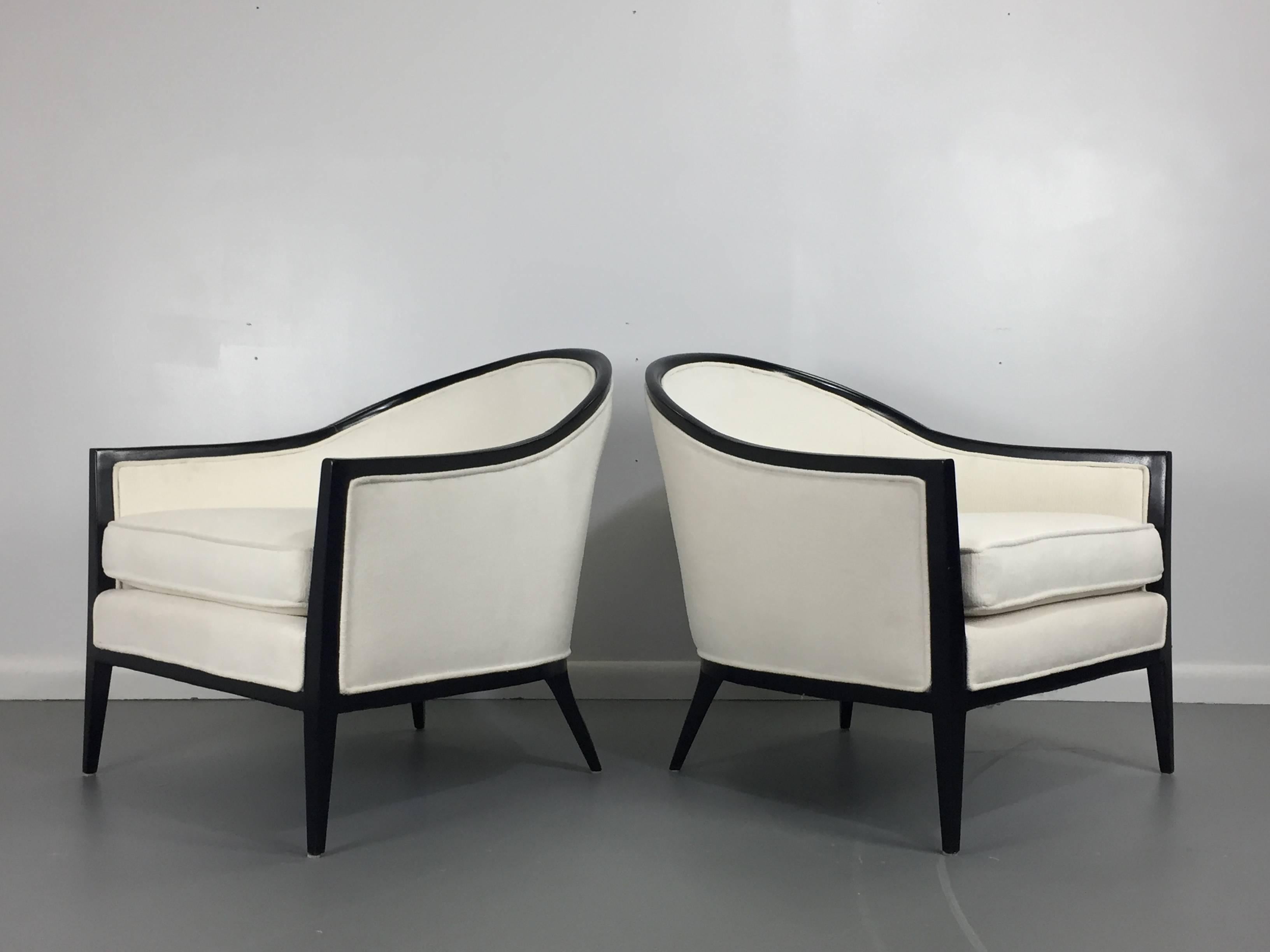These 1960s Harvey Probber lounge chairs have had a total transformation beginning with a complete renovation of the frame ebonized in a luxurious black. The chairs are upholstered in a beautiful textured white velvet.
 