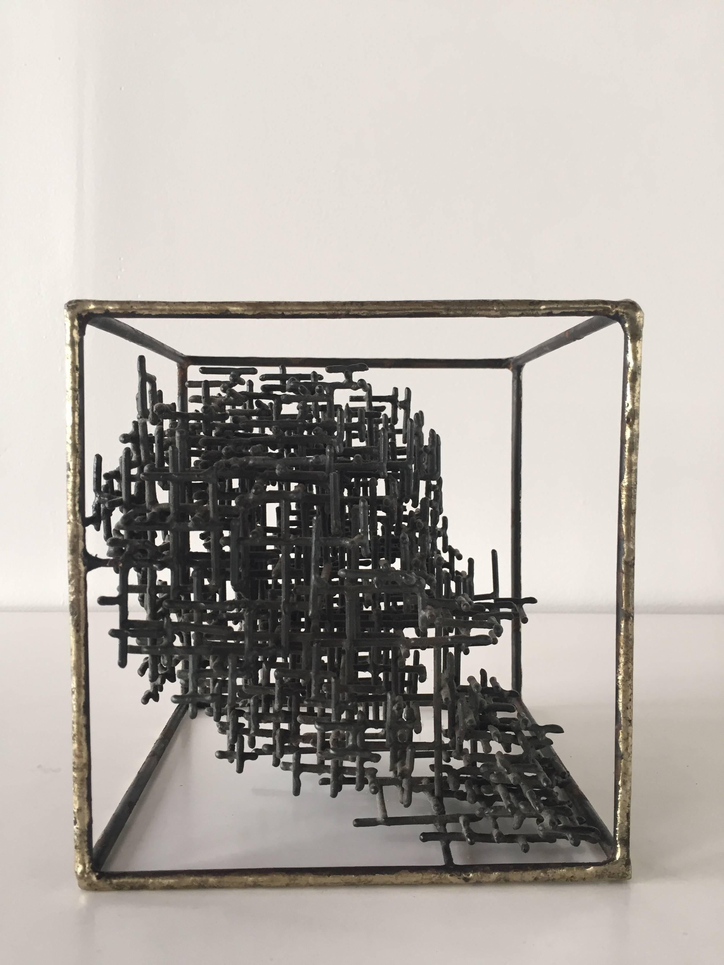 Mid-Century Modern metal sculpture with intricate cloud-like grid structure held in equilibrium inside a gold frame. Appears different from each angle. Impressive labor-intensive work. A beautiful modern artwork. Purchased in a gallery focused on