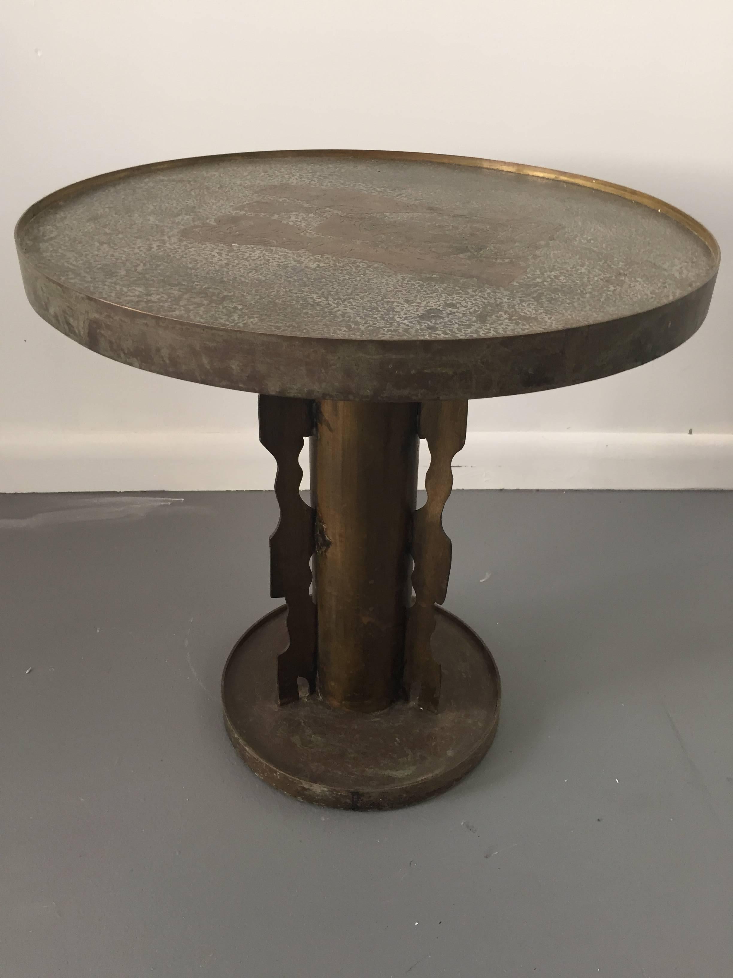Acid-etched polychromed brass and pewter side table by Philip and Kelvin LaVerne with an Etruscan motif.

This father and son team worked in that extraordinary period with Harvey Probber, Vladimir Kagan, George Nelson, Harry Bertoia, and Paul Mccobb.