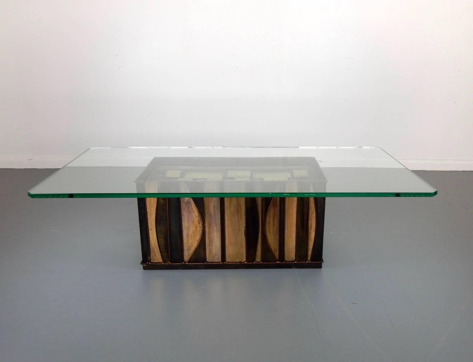 This is a C. Jere coffee table in a Brutalist style. The table is signed and dated.

Jere worked in that extraordinary period with Harvey Probber, Vladimir Kagan, George Nelson, Harry Bertoia, Paul Evans, and Paul Mccobb.