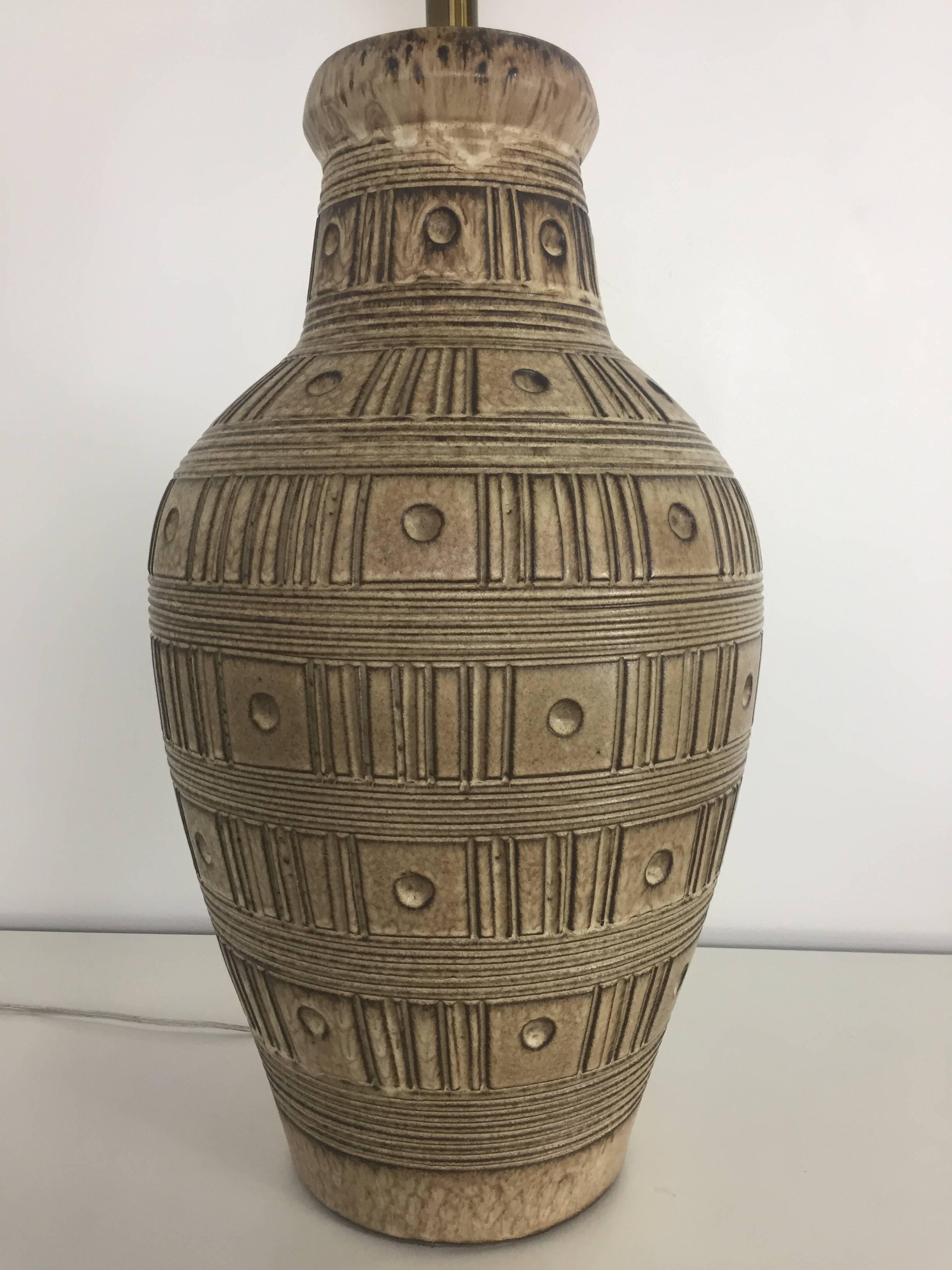 This Design Technics lamp has the Classic Design Technics artful glaze and uniquely incised design on this entire lamp. The lamp is in perfect shape; it is a rare large size.