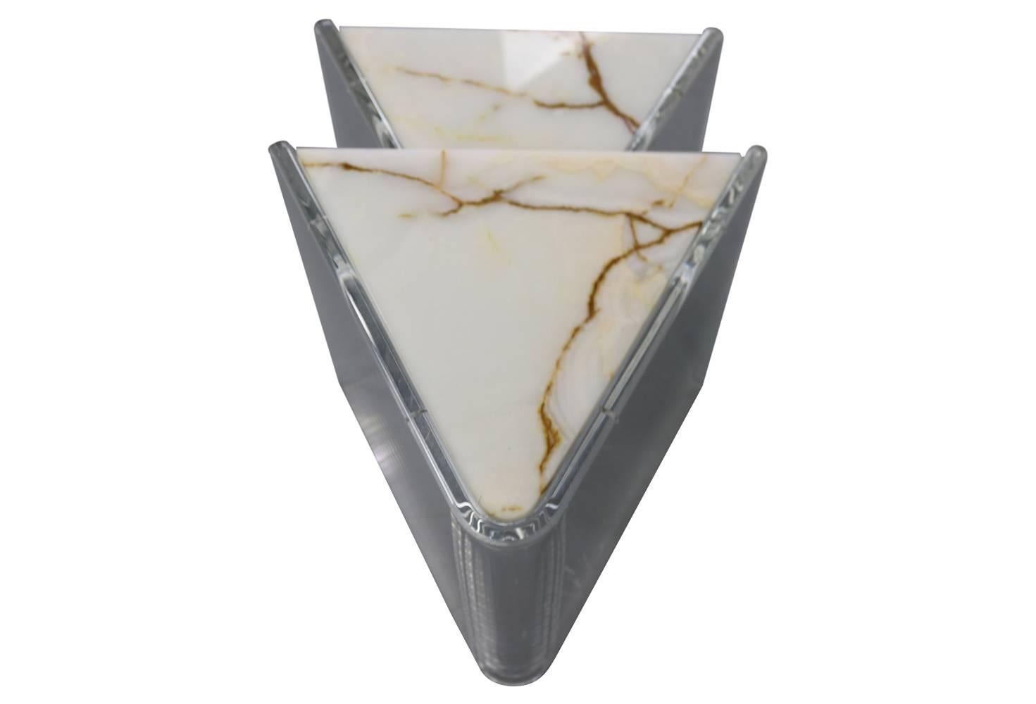 Pair of exquisite geometric stacking tables in marble and Lucite. White marble with caramel brown veining.
