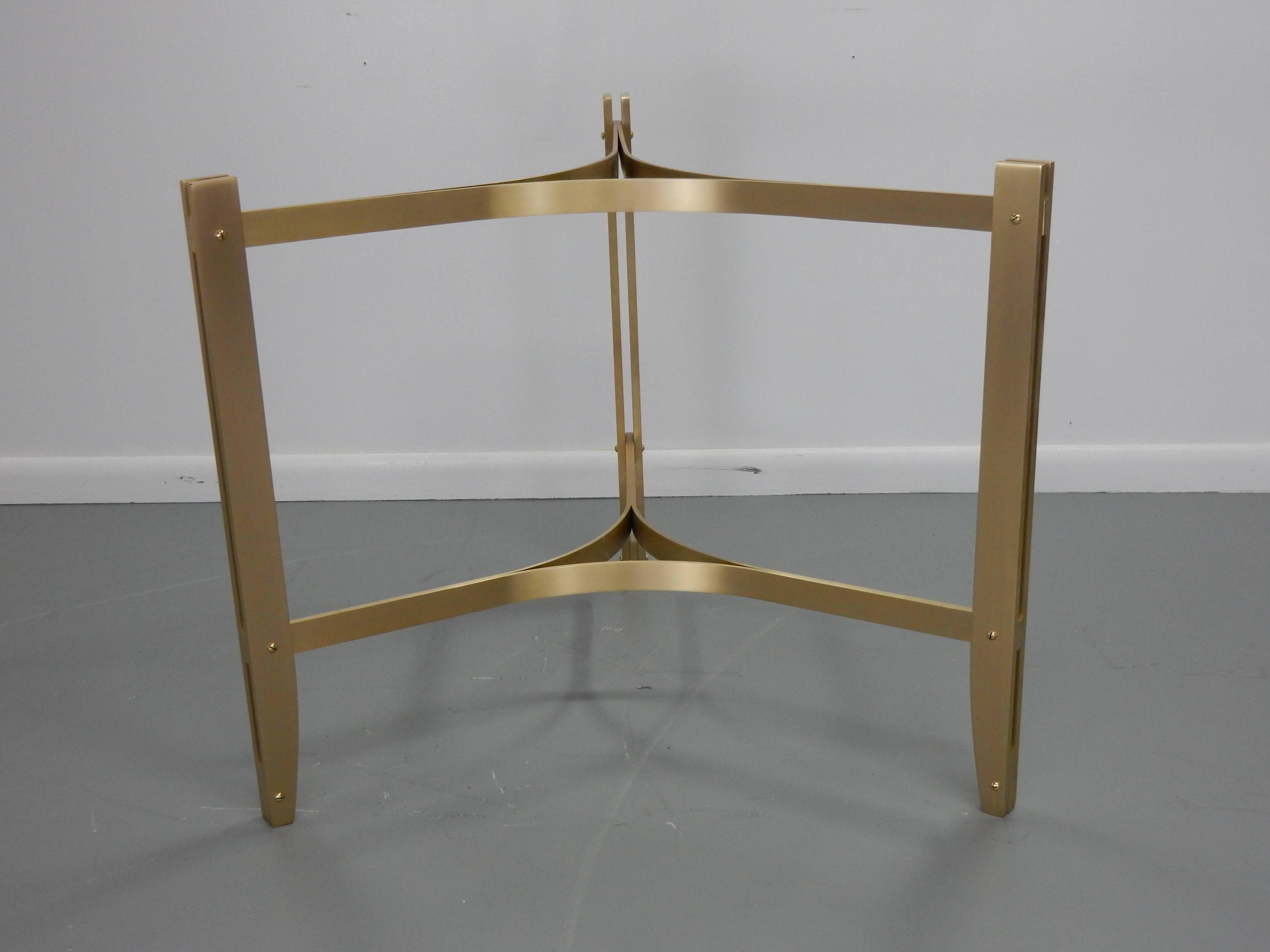 This table is constructed of solid flat bar brass that has been professionally polished.


Milo Baughman worked in the same period as Paul Mccobb, Harvey Probber, and George Nelson