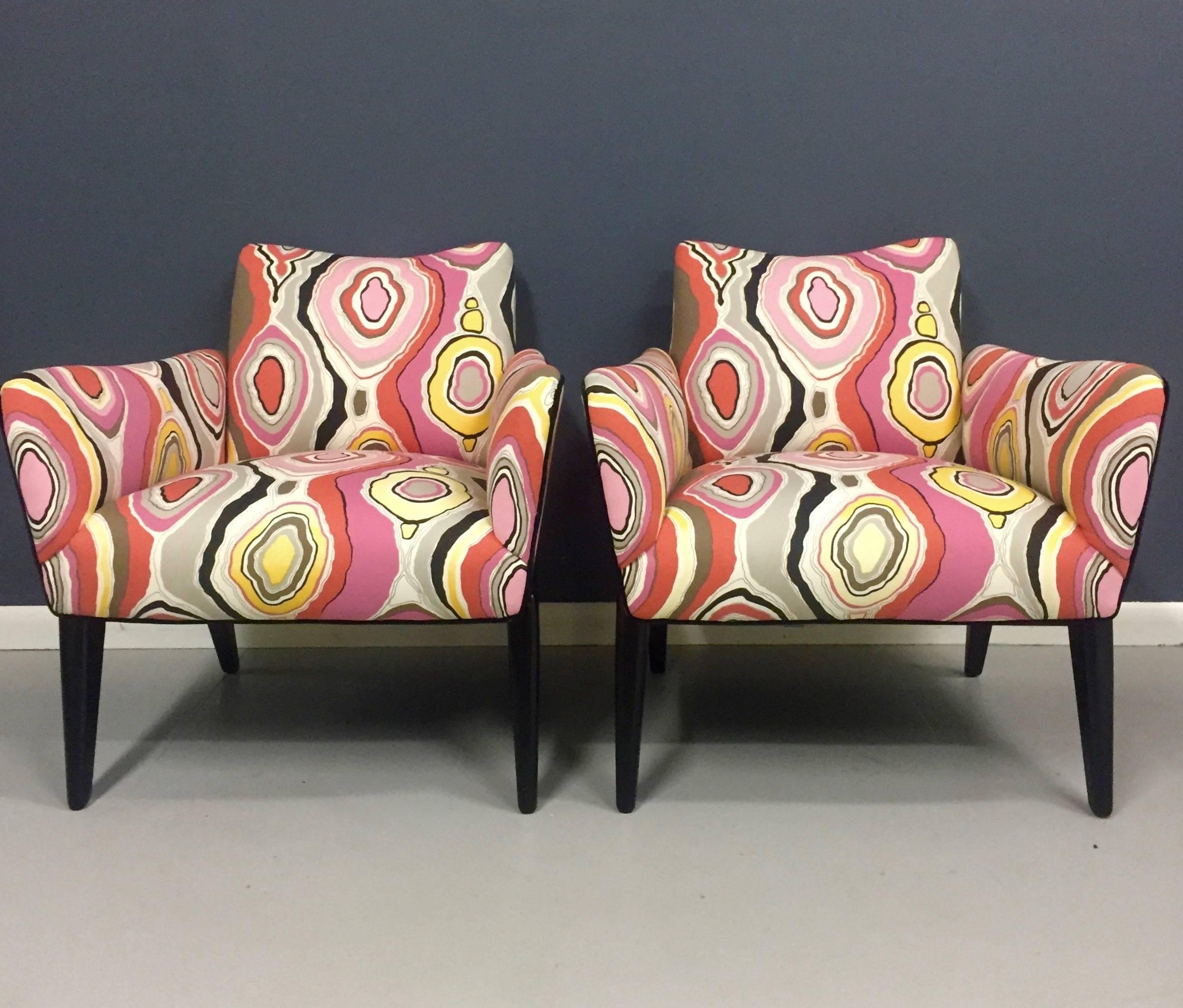 Italian lounge chairs after Ico Parisi with ebonized base, upholstered in Pucci style fabric.

Ico & Luisa Parisi were working in the same period as Paola Buffa, their friend Gio Ponti and Silvio Longhi.