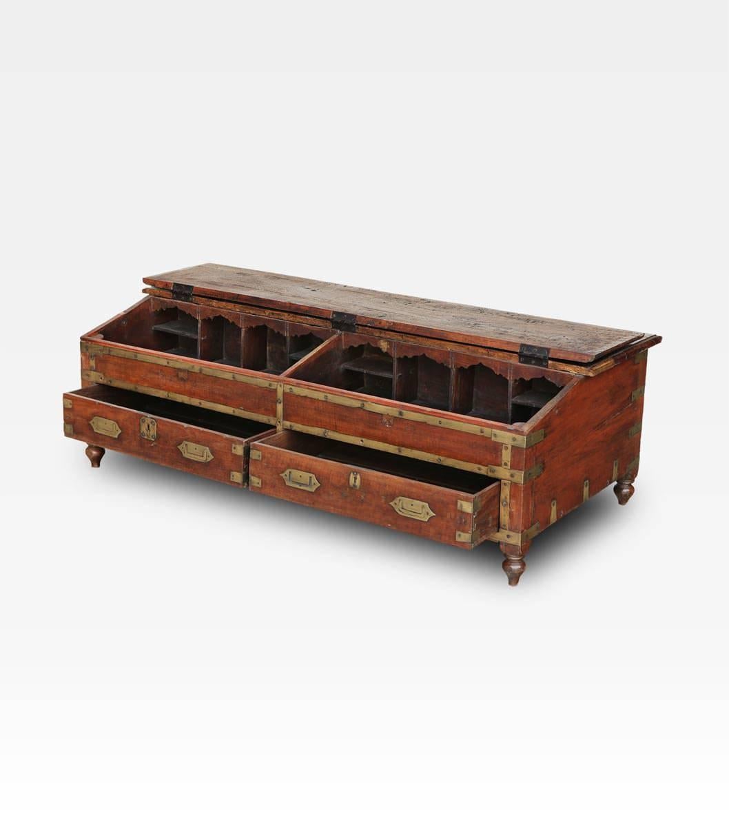 This small Indian travel trunk tells about stories of the Europeans who, defying the sea, arrived to the East. Also used as a desk by the captain of the ship, under the top on can see typical Indian design. The many small compartments and niches