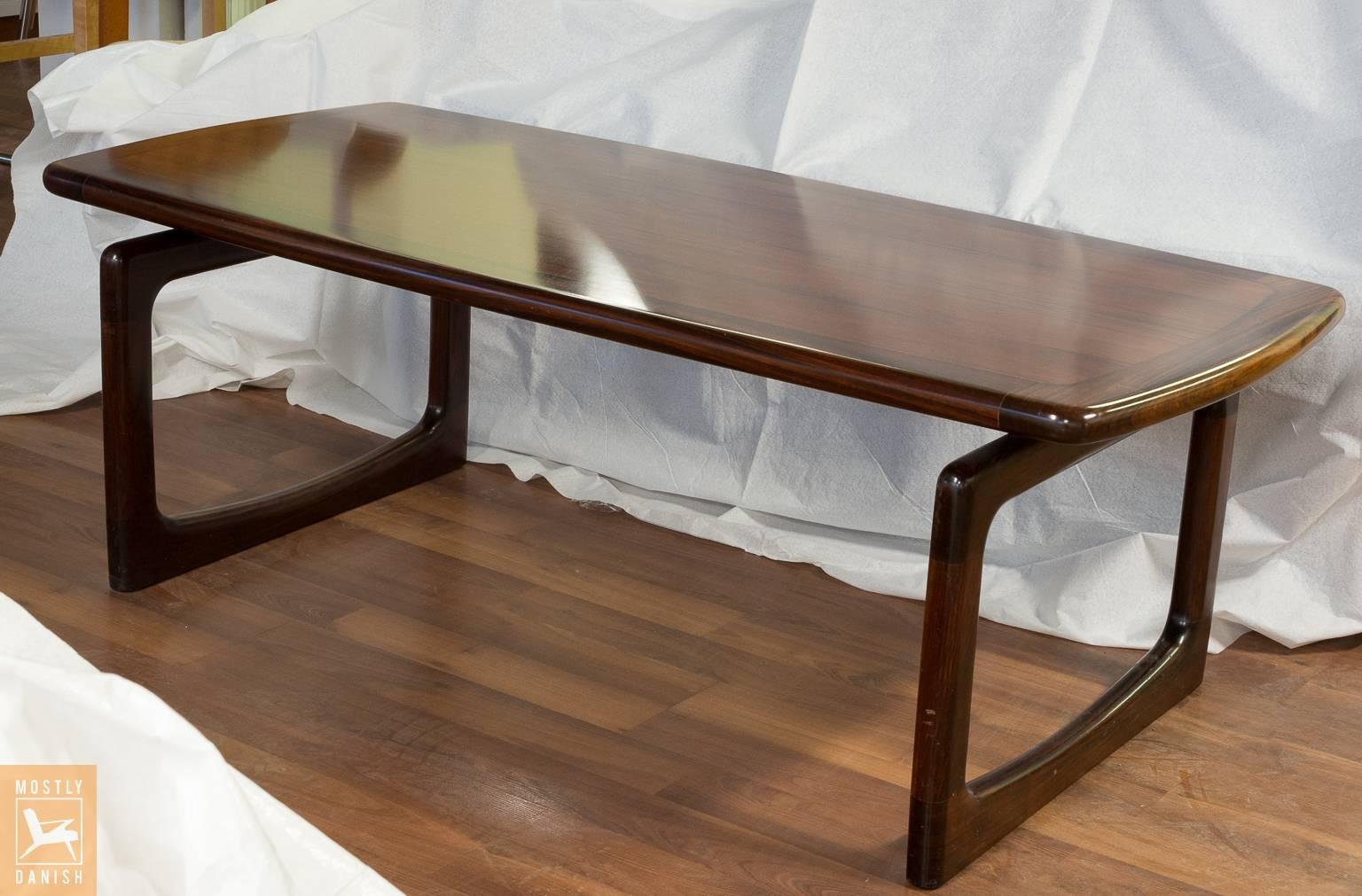 Exquisite rosewood coffee table from Dyrlund, Denmark. 