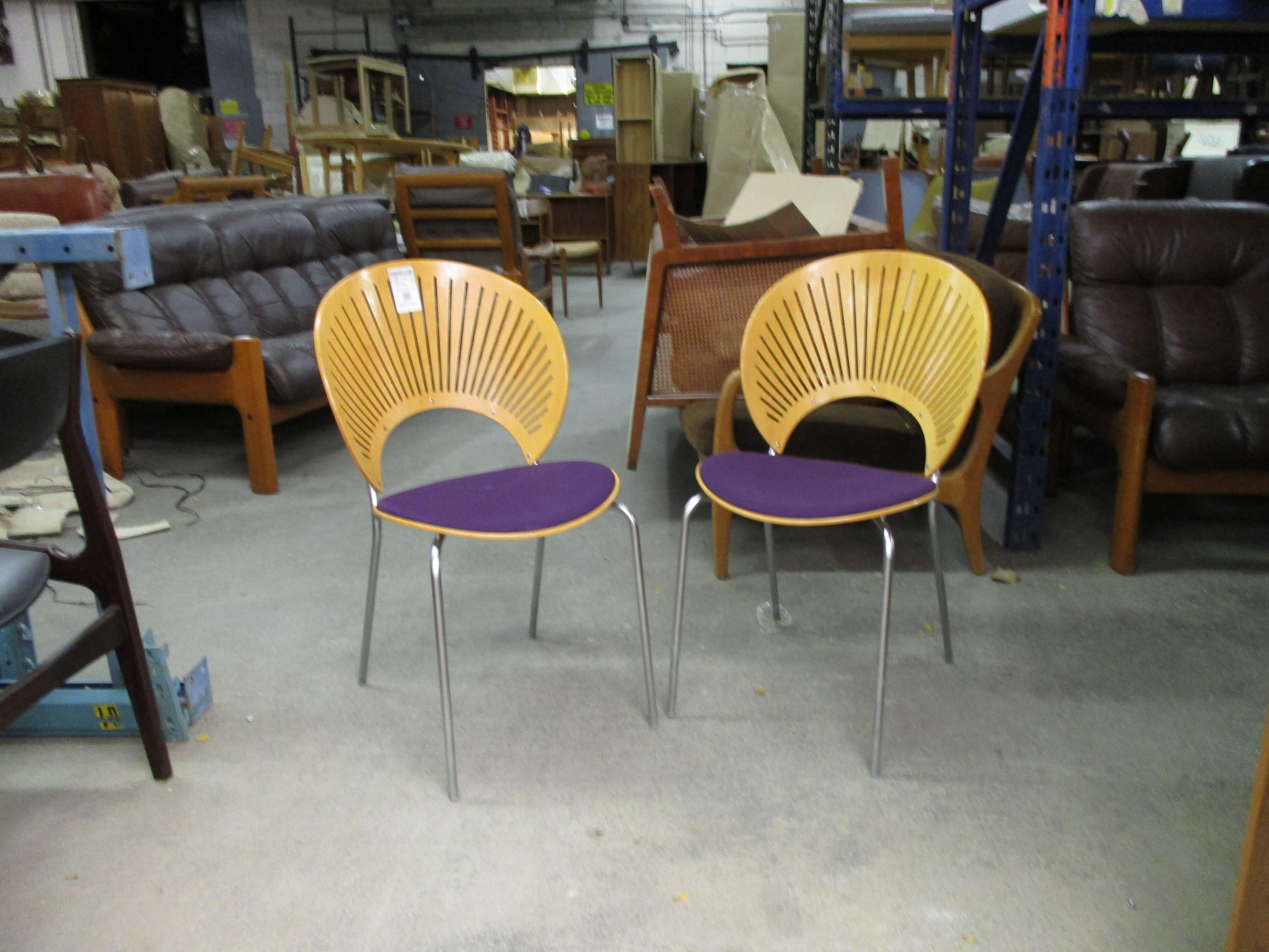 Striking set of four Trinidad chairs by Nana Ditzel in oak with steel frame.