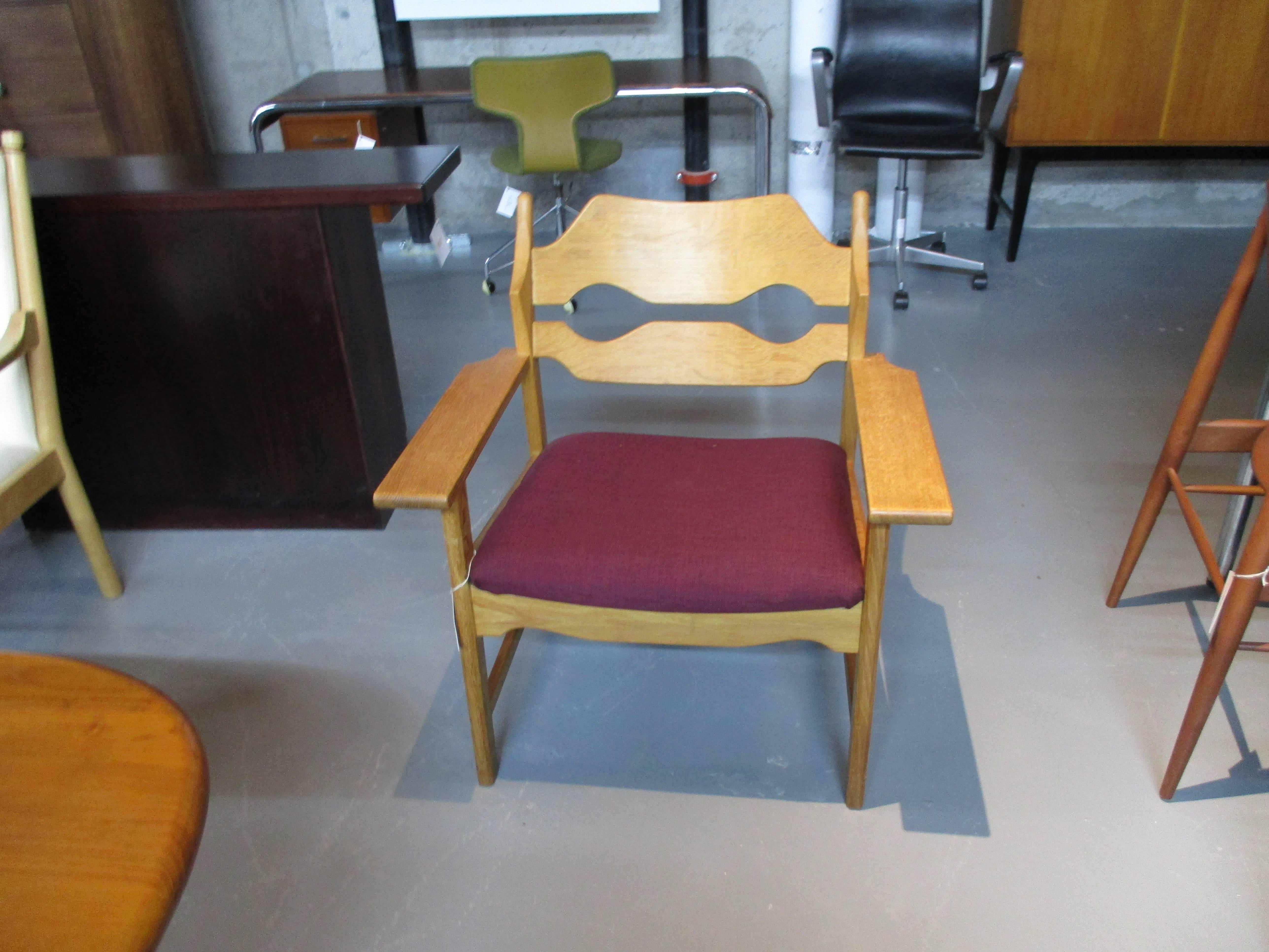 Henning Kjaernulf oak armchair manufactured by EG Mobler, Denmark.