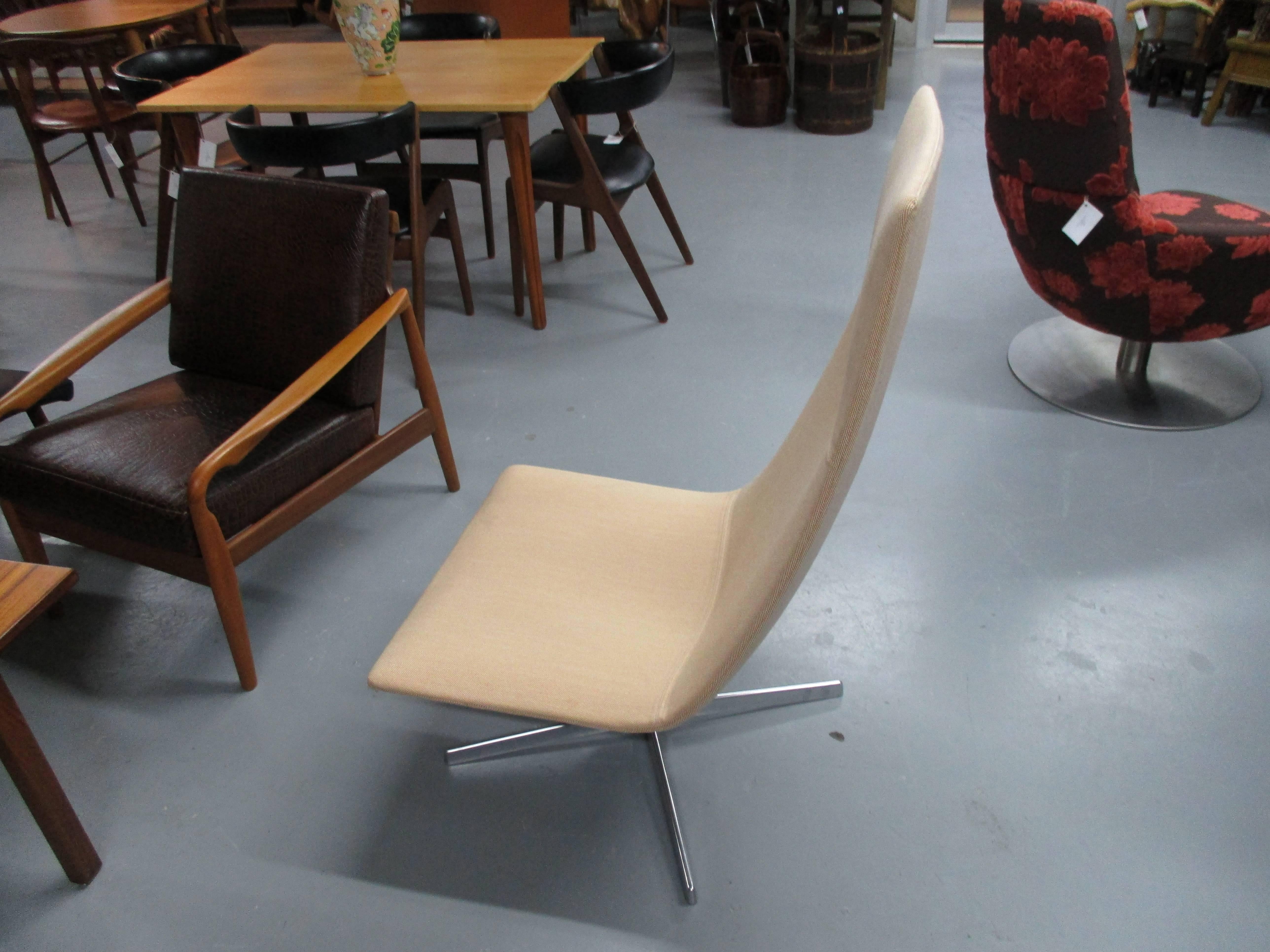 Smooth style swivel chair by Lievore, Altherr and Molina.