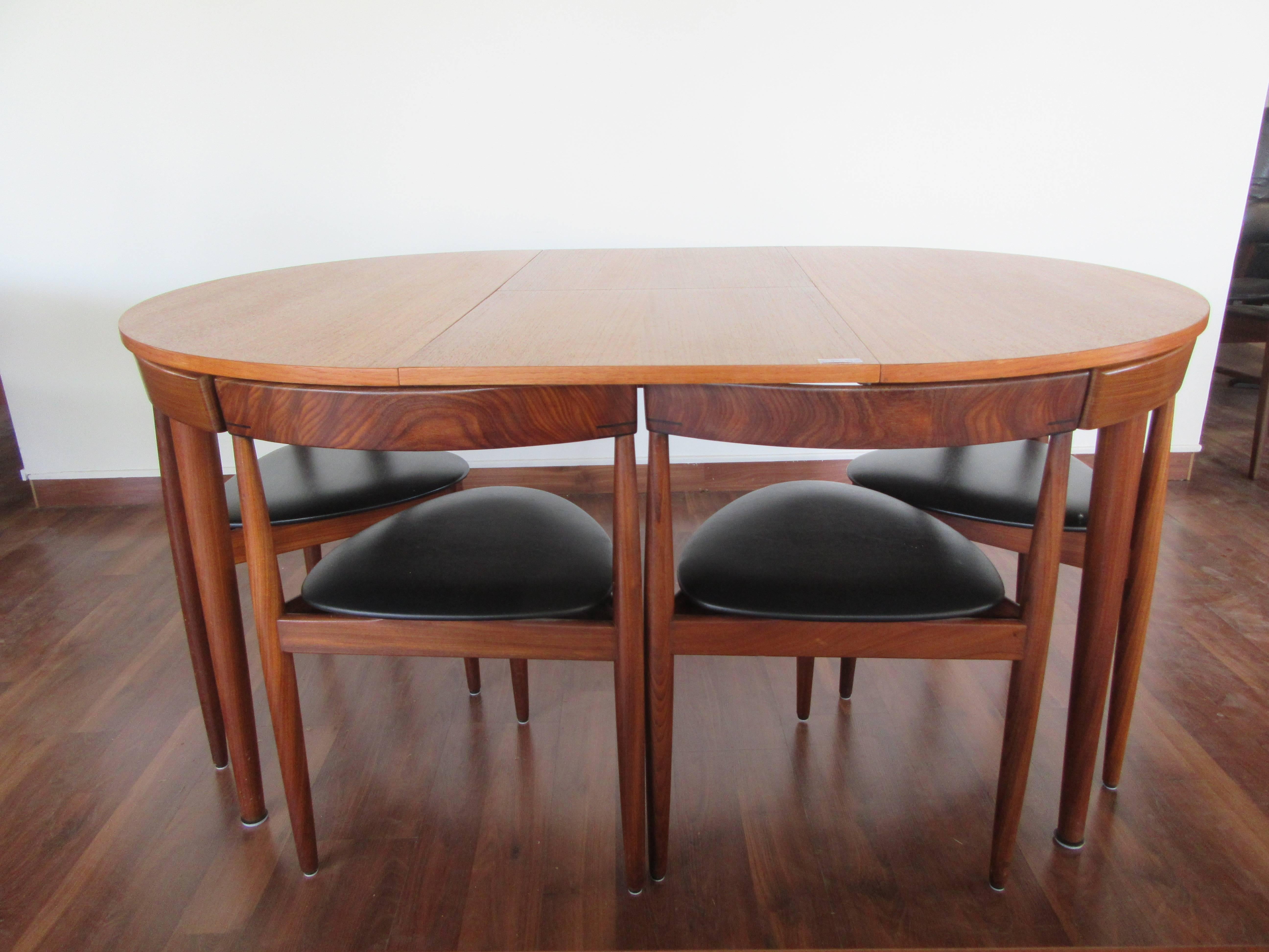 Rare Hans Olsen Teak Table with Leaf and Six Chairs That Tuck under