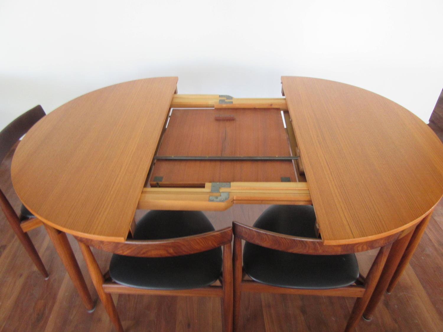 Rare Hans Olsen Teak Table with Leaf and Six Chairs That Tuck under