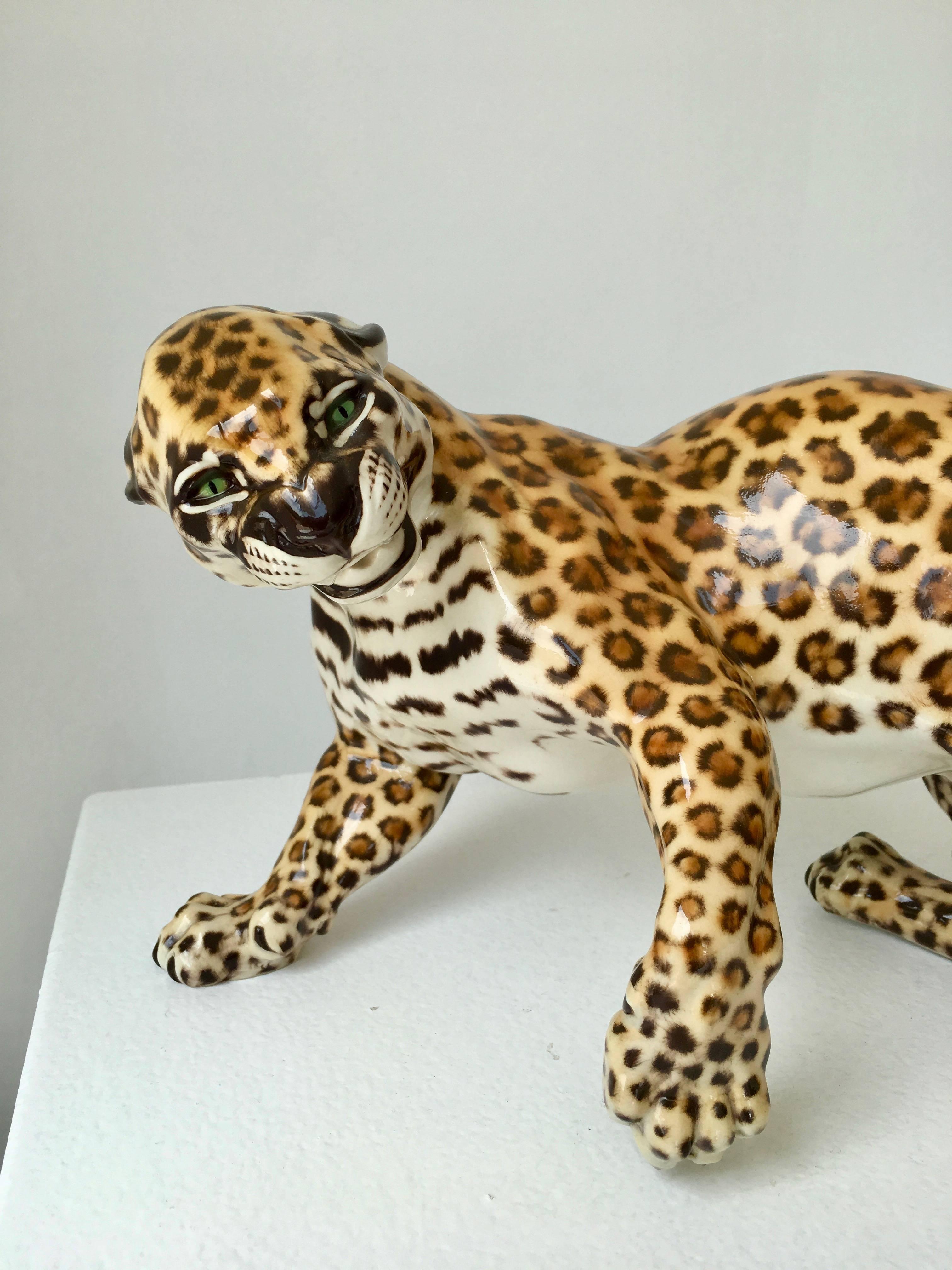 The leopard Zola from a series of Art Nouveau fine porcelain figurines modeled by Hans Behrens in 1904 for Porzellan Manufaktur Nymphenburg. In production since 1904, this lifelike piece dates to the 1960s.

Nymphenburg was founded in 1747 as the