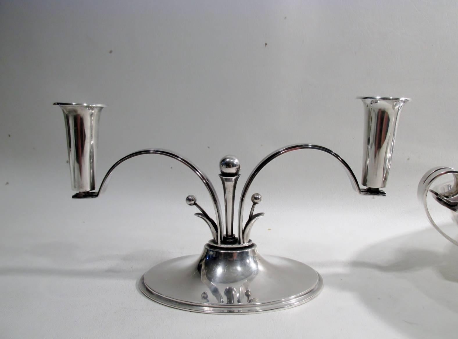 Important and fine three-piece sterling silver Jugendstil table centrepiece set from renowned Danish jeweler Carl. M. Cohr. Comprised of a pair of stylized floral candelabrum with centerpiece bowl. Centrepiece bowl measures approximate 9.5