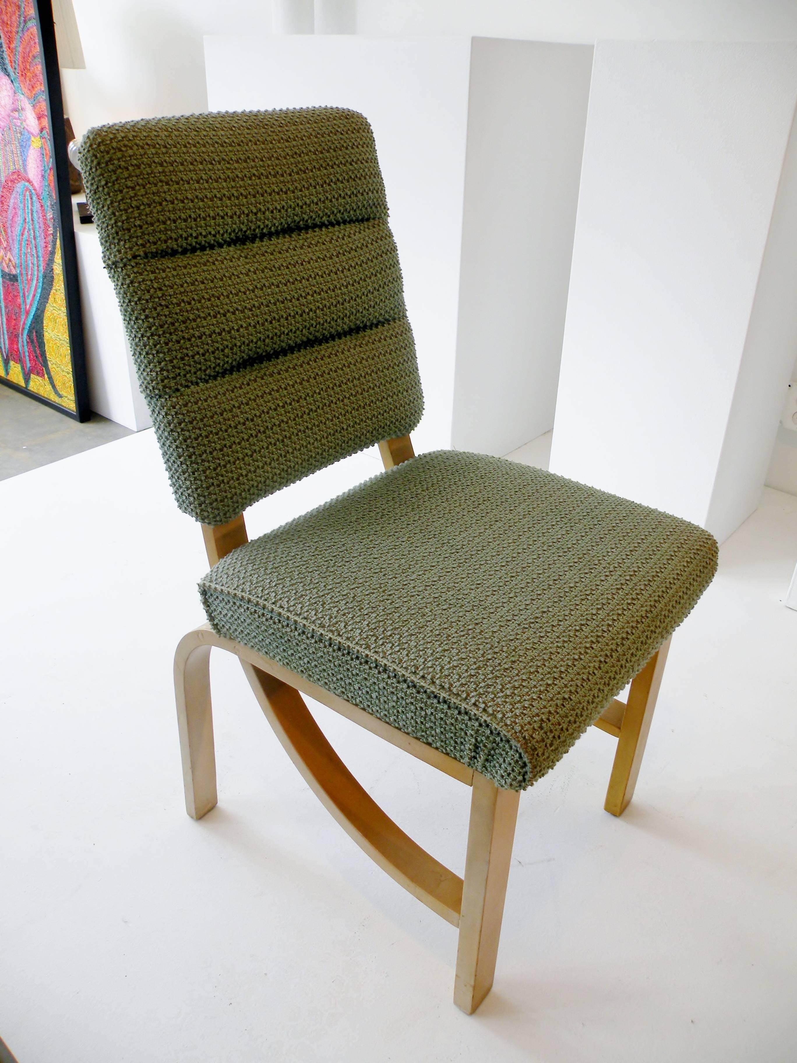 An early side chair in original condition and upholstery. Dating to the 1940s the transitional design crosses streamline moderne Art Deco lines with emerging midcentury simplicity.