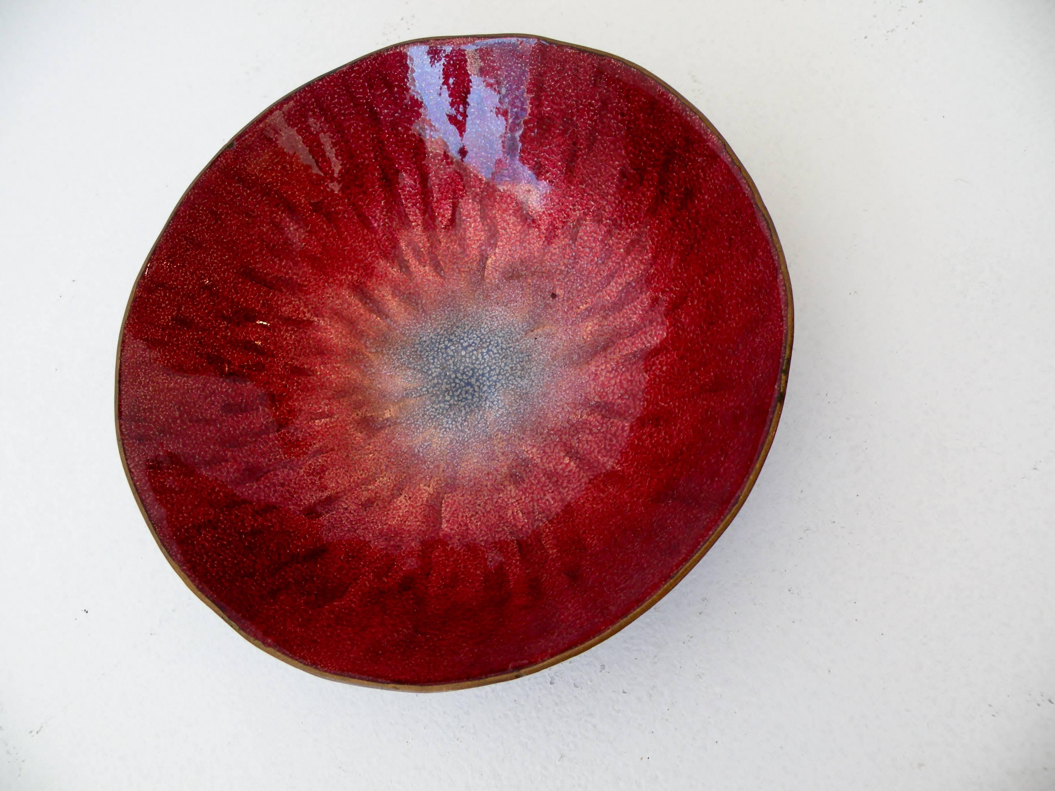 Rich red with blue enameled bowl with figured surface from the workshop of Paolo DePoli and designed by Gio Ponti. Signed DePoli to base.