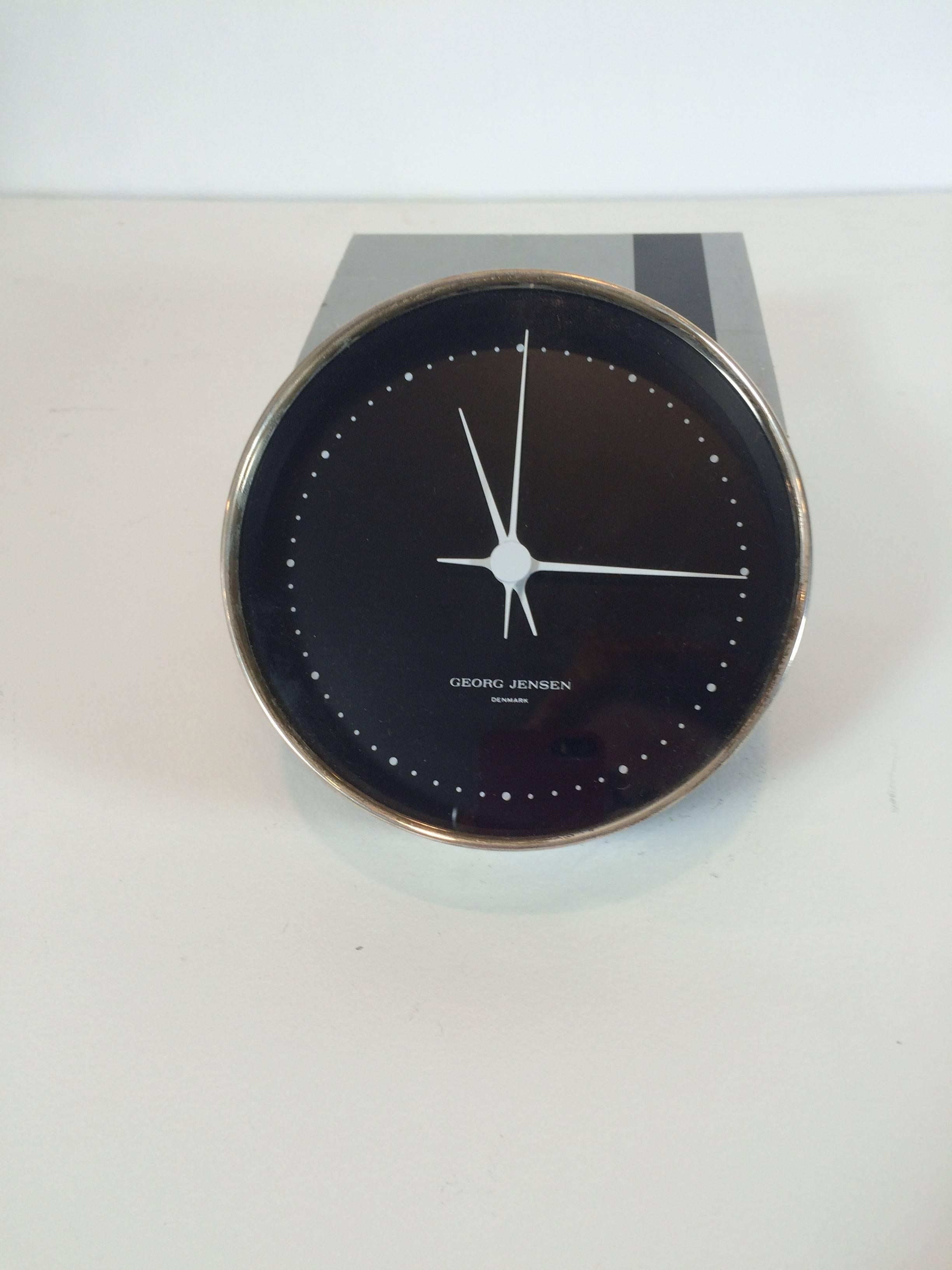 Very rare Georg Jensen sterling silver wall clock, signed, has German quartz movement, factory mark, sterling mark, and Henning Koppel's mark in the case.

Koppel timepiece designs were revolutionary when they debuted in 1978, today Koppel’s