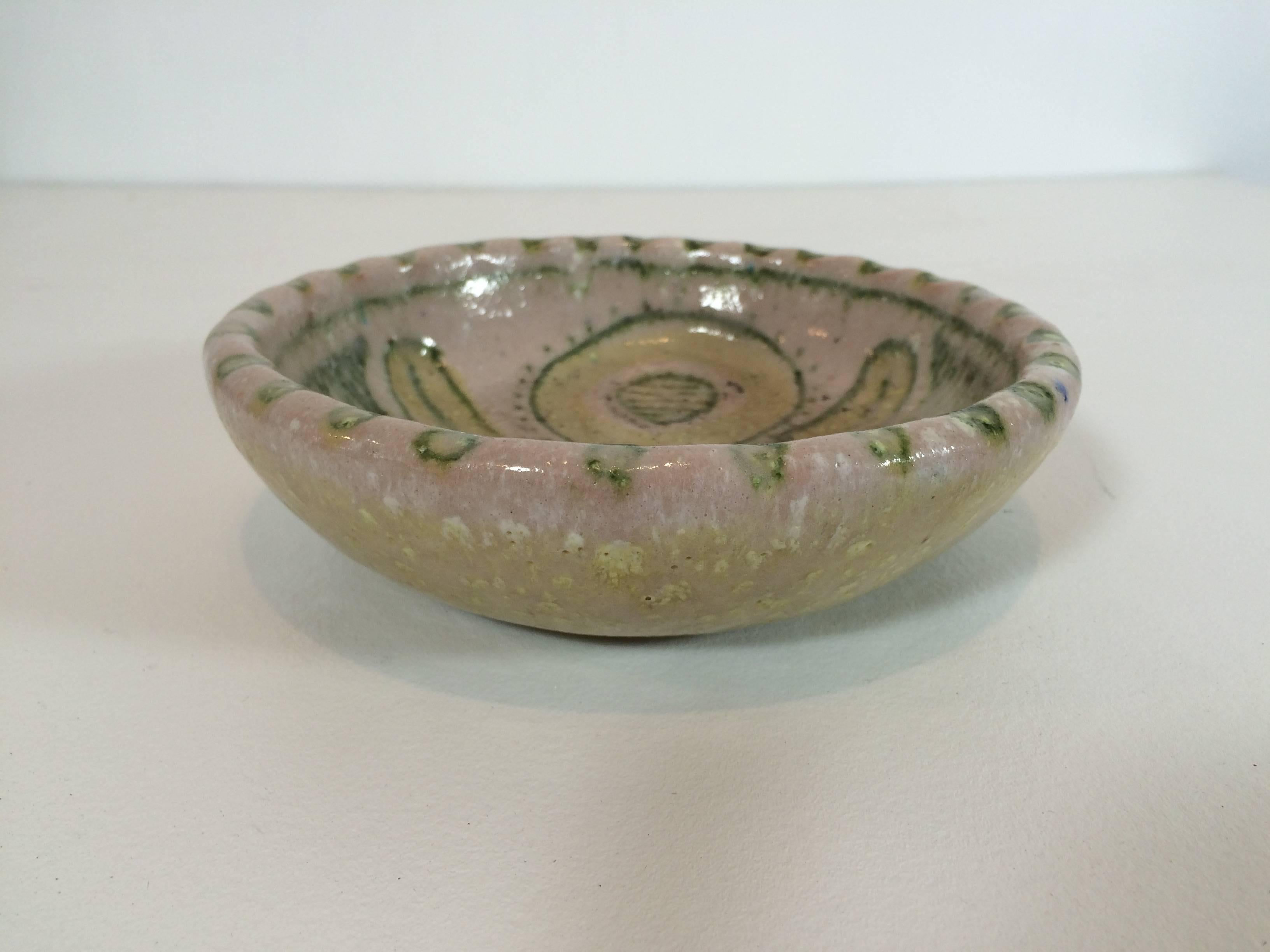 Handmade 1960s Gambone bowl with donkey marking on back, indicating Guido's hand created the piece. 

Gambone was an modern ceramic artist of the 1950s and 1960s whose work has become a favourite for collectors due to his playful use of shapes and