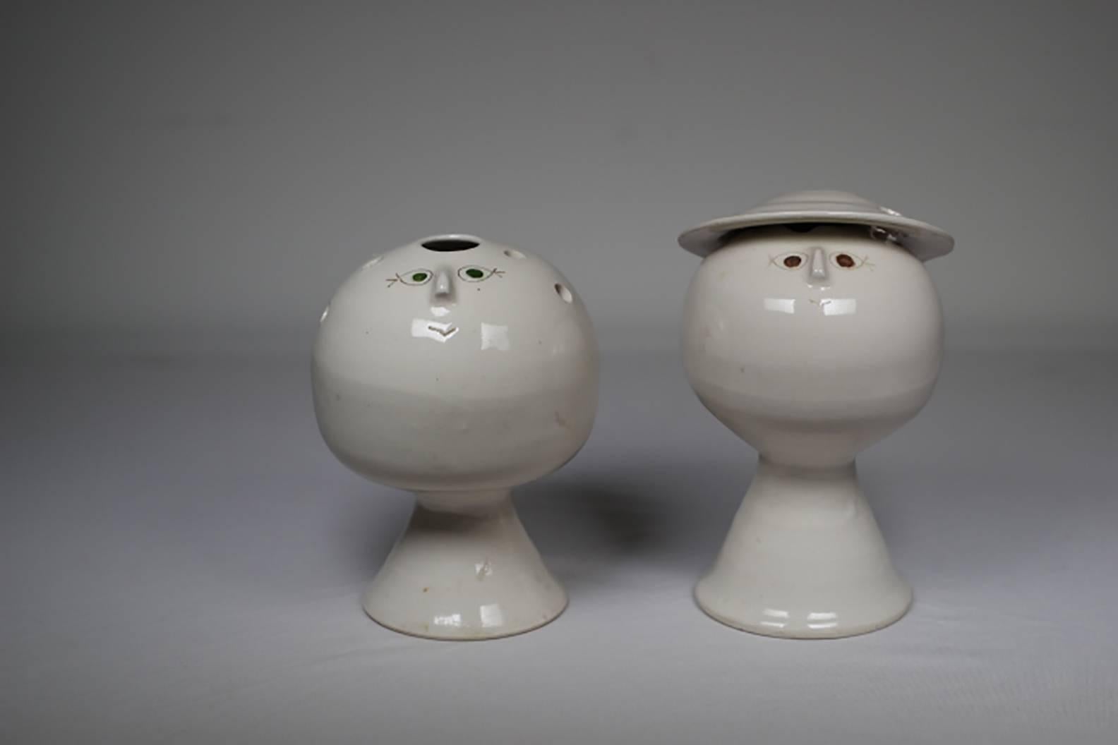 Pair of charming glazed ceramic bud vases/sulptures. Signed 