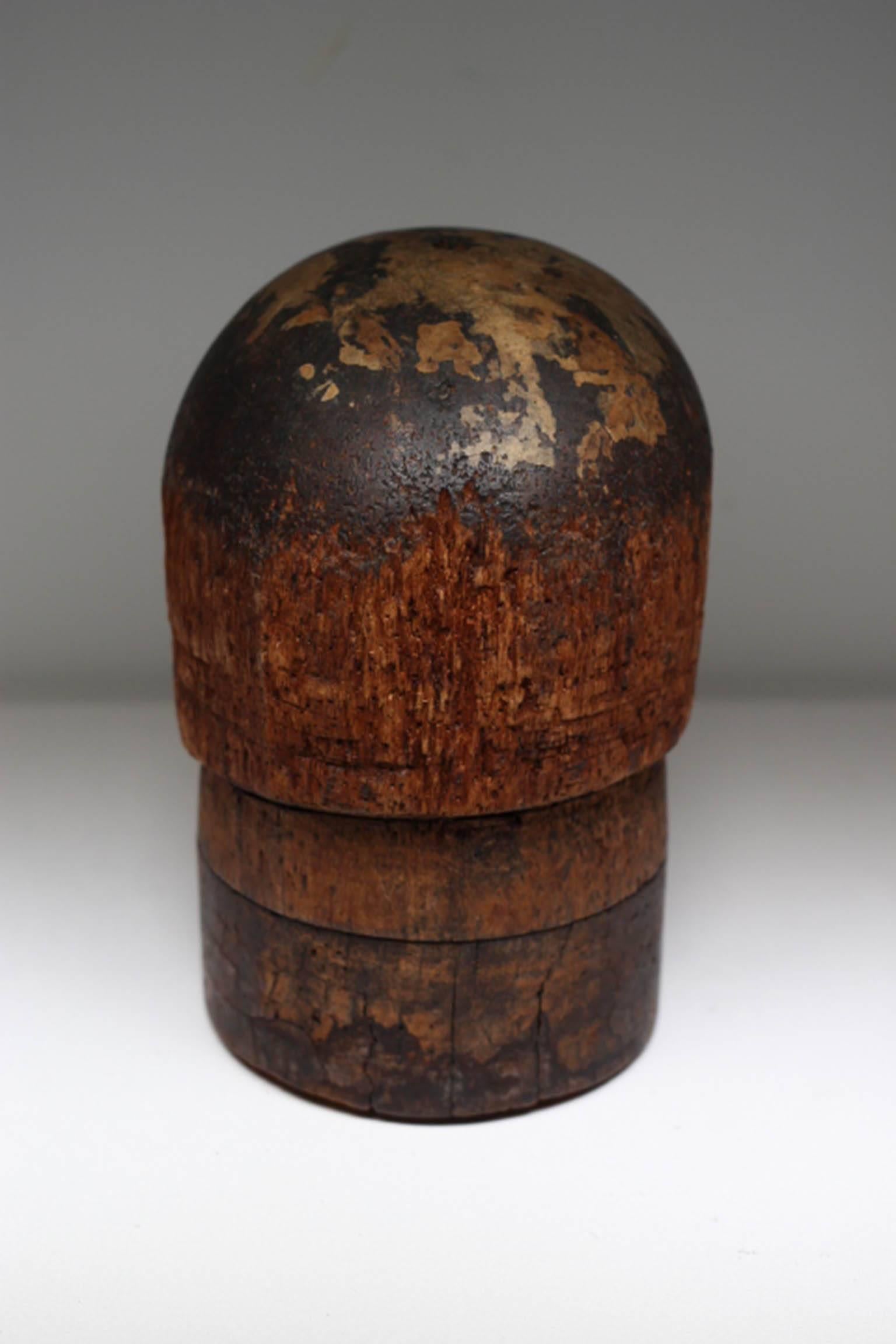 Beautifully distressed wooden hat mold.