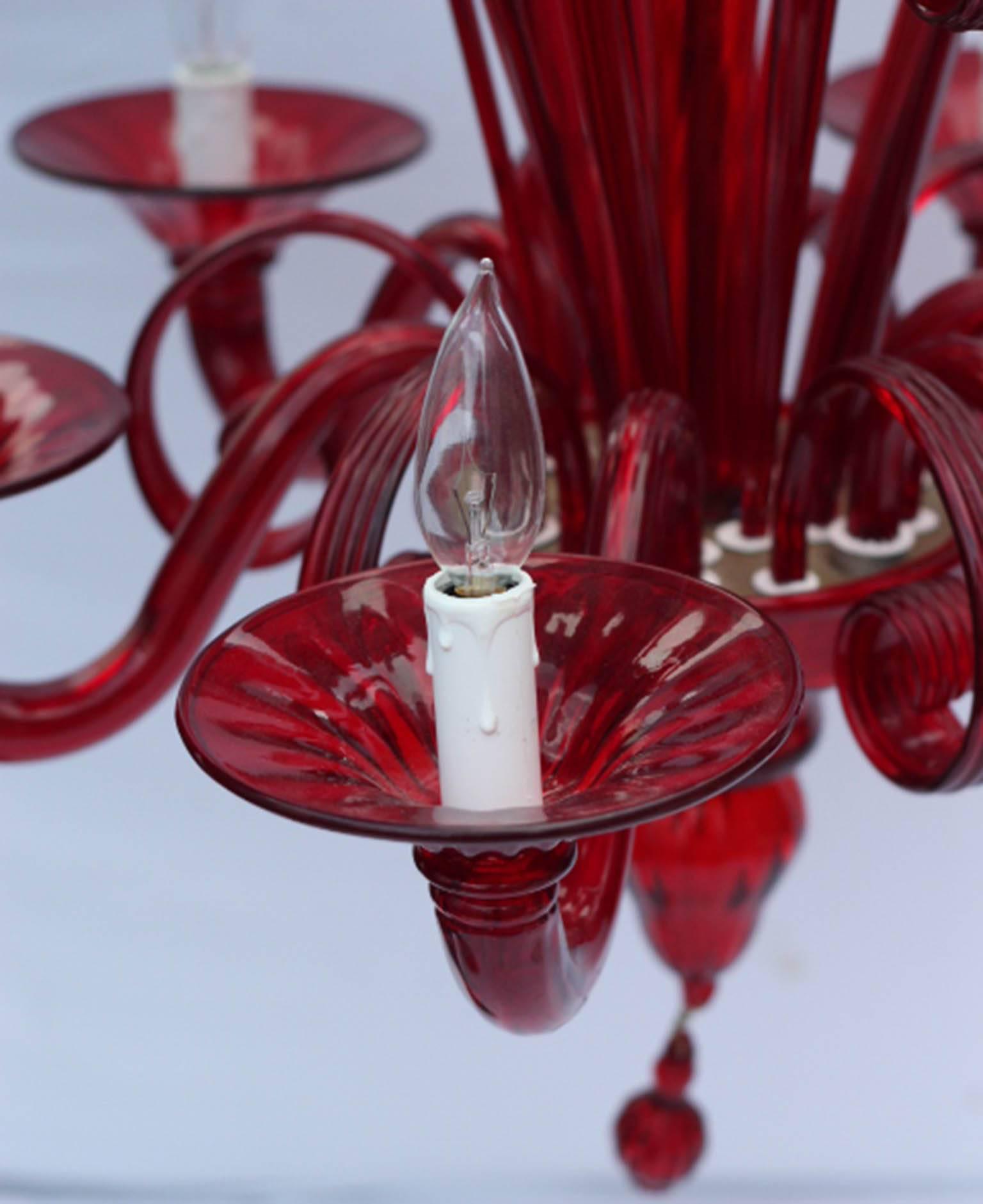 Vibrant red handblown Murano chandelier with six arms. 
Body: 32