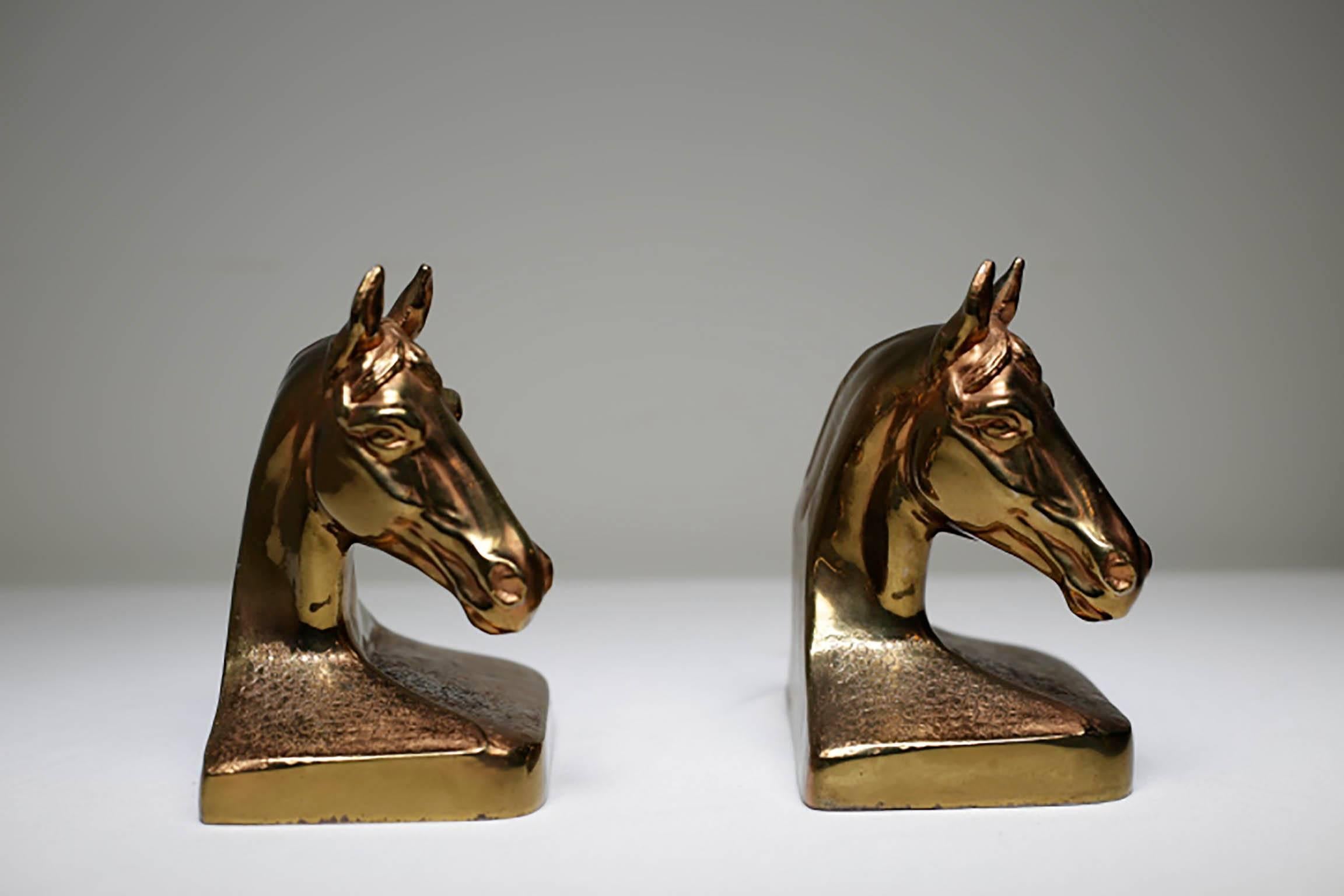 Pair of brass cast with a lacquered finish horse bookends by the Philadelphia Manufacturing Co.