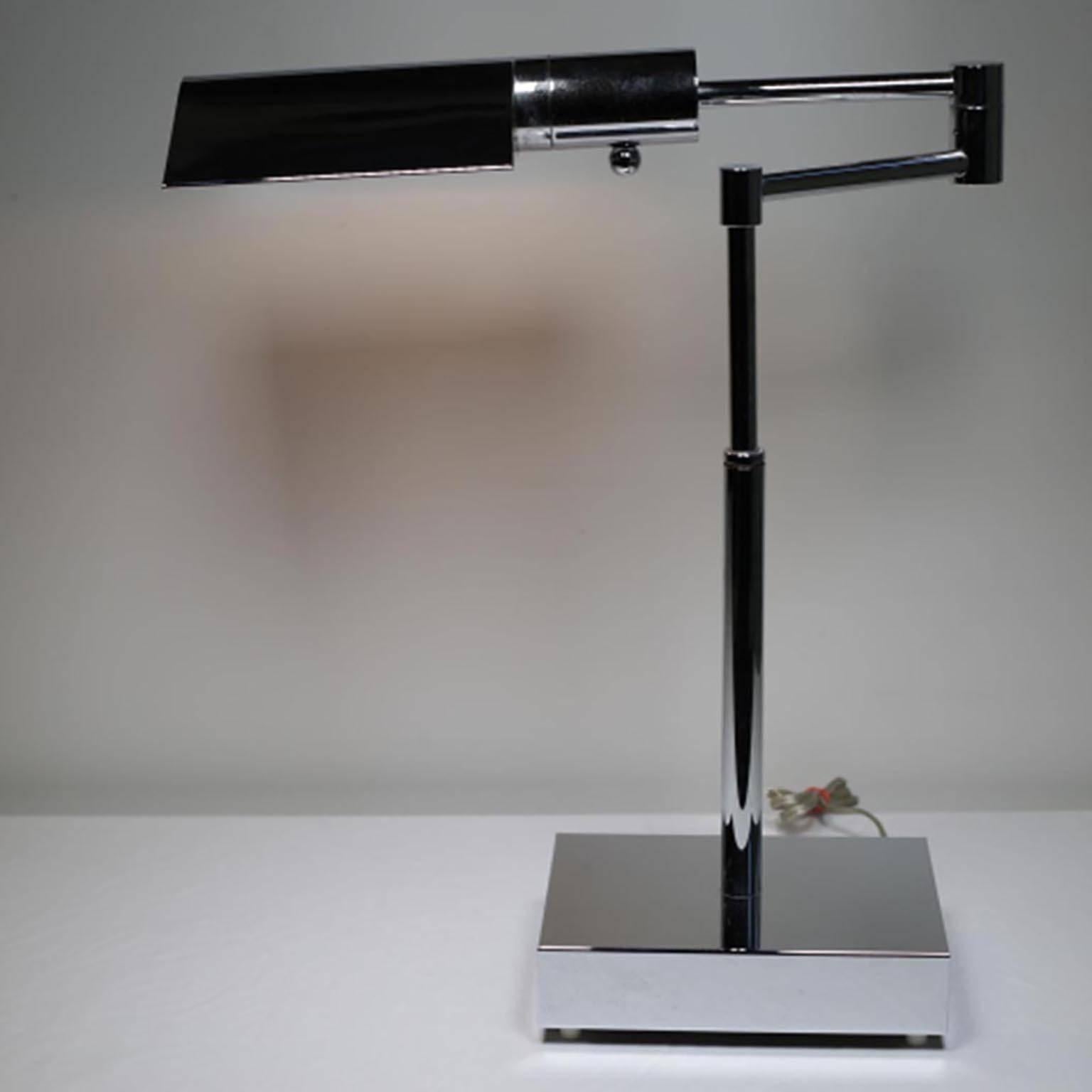 One nickel-plated lamp. The lamp is adjustable and adjust the height of 24