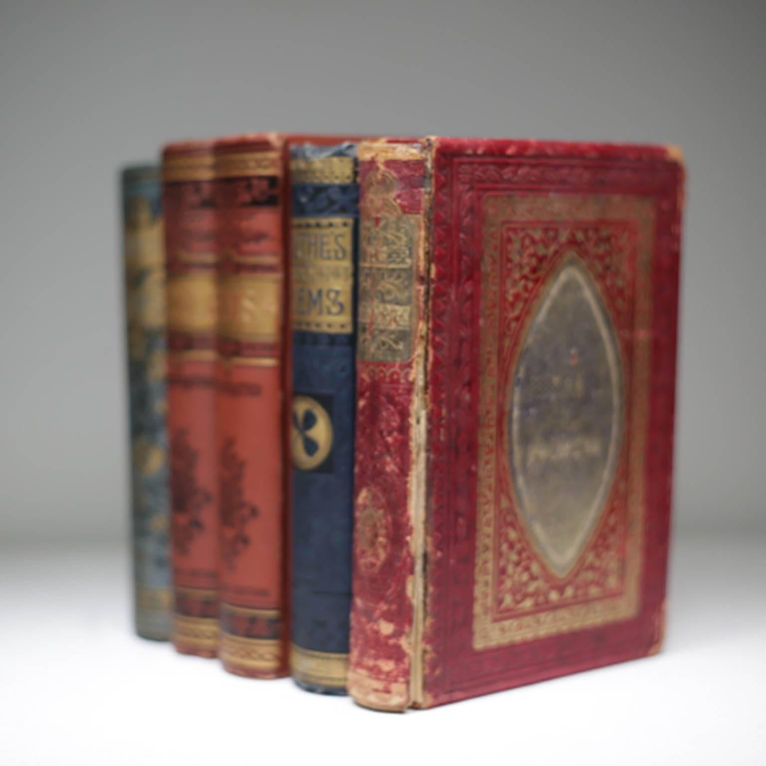 19th century set of five books, circa 1860s. Two books are signed 1861 and 1863. As gifts to someone. All the books pages are gold lined on the top, side and bottom.