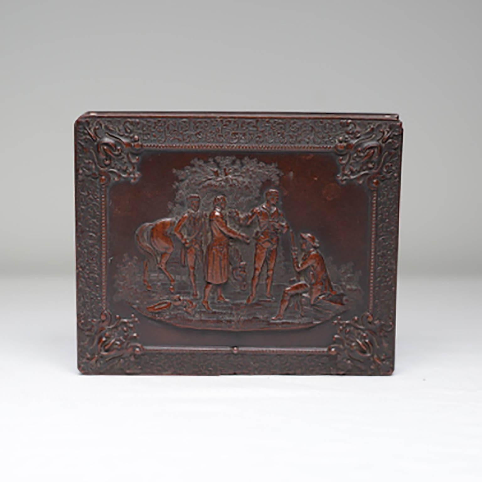 Large daguerreotype in embossed case, circa 1880s. Case is lined with velvet and made of Gutta Percha which is a tough plastic substance from the latex of several Malaysian trees (genera Payena and Palaquium) that resembles rubber but contains more