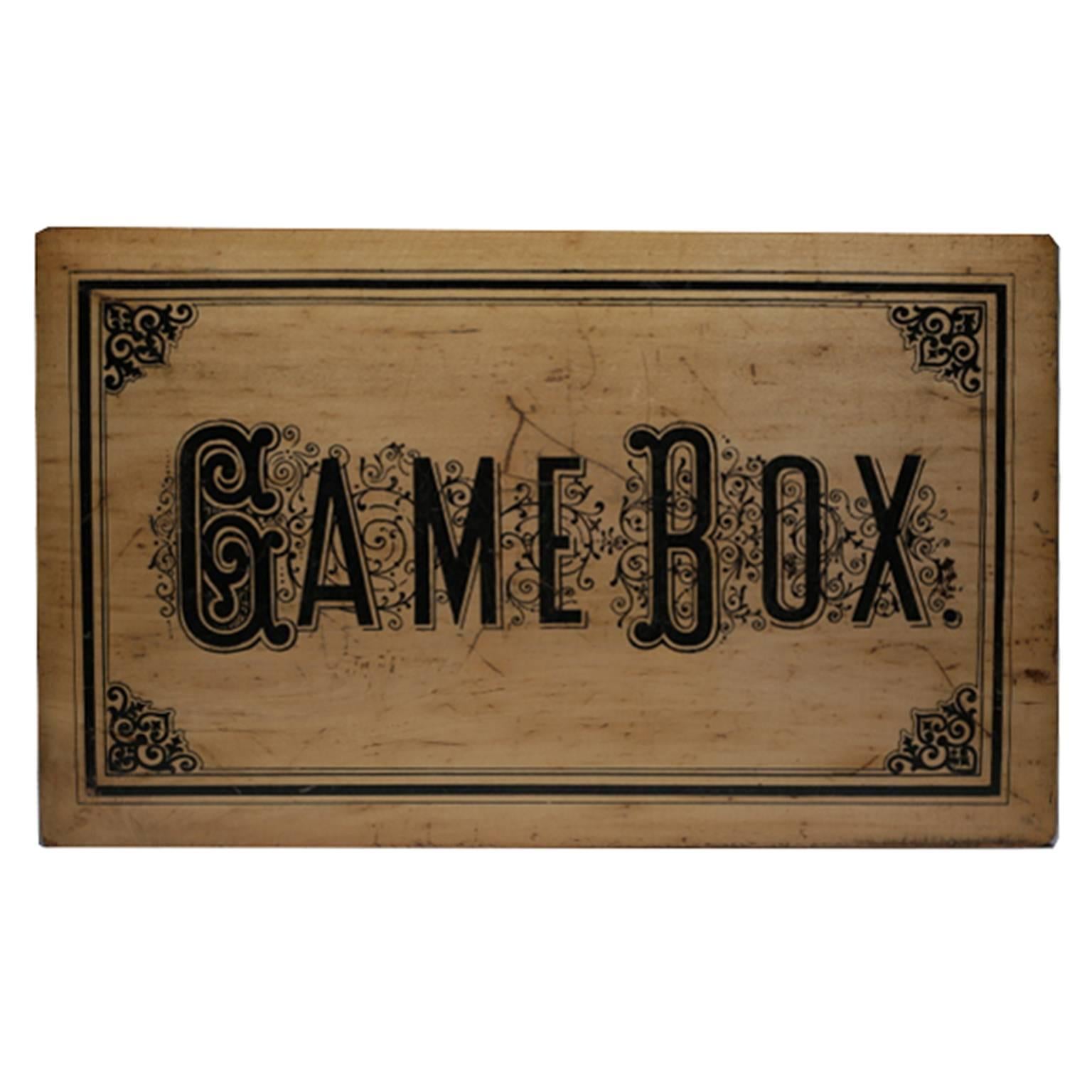 Beautiful game box containing several games. All complete sets with a double game board, lotto cards, two wooden dice cupes and four dice made of bone, circa 1900.