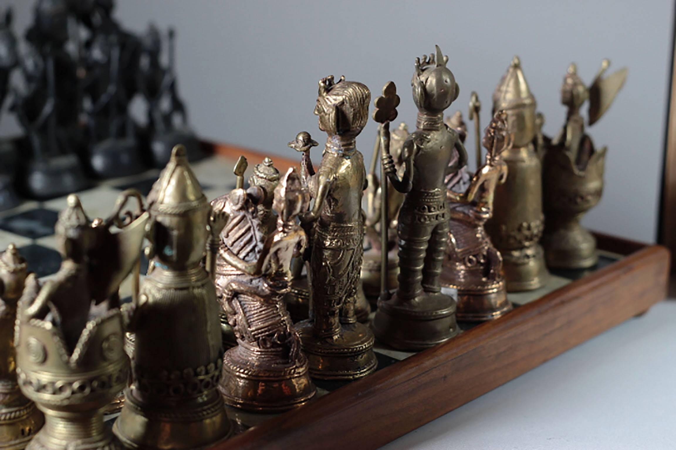 Solid brass chess pieces varying in sizes from 3