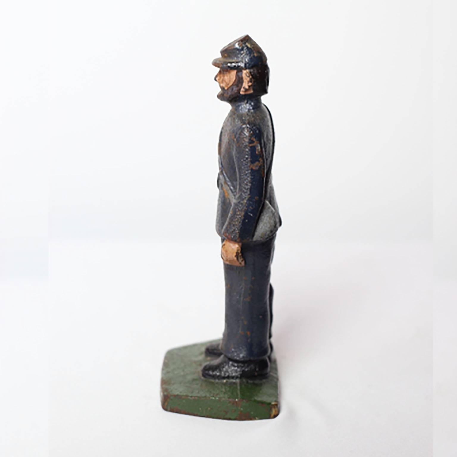 Cast iron confederate soldier. Possible a bookend or a doorstop.