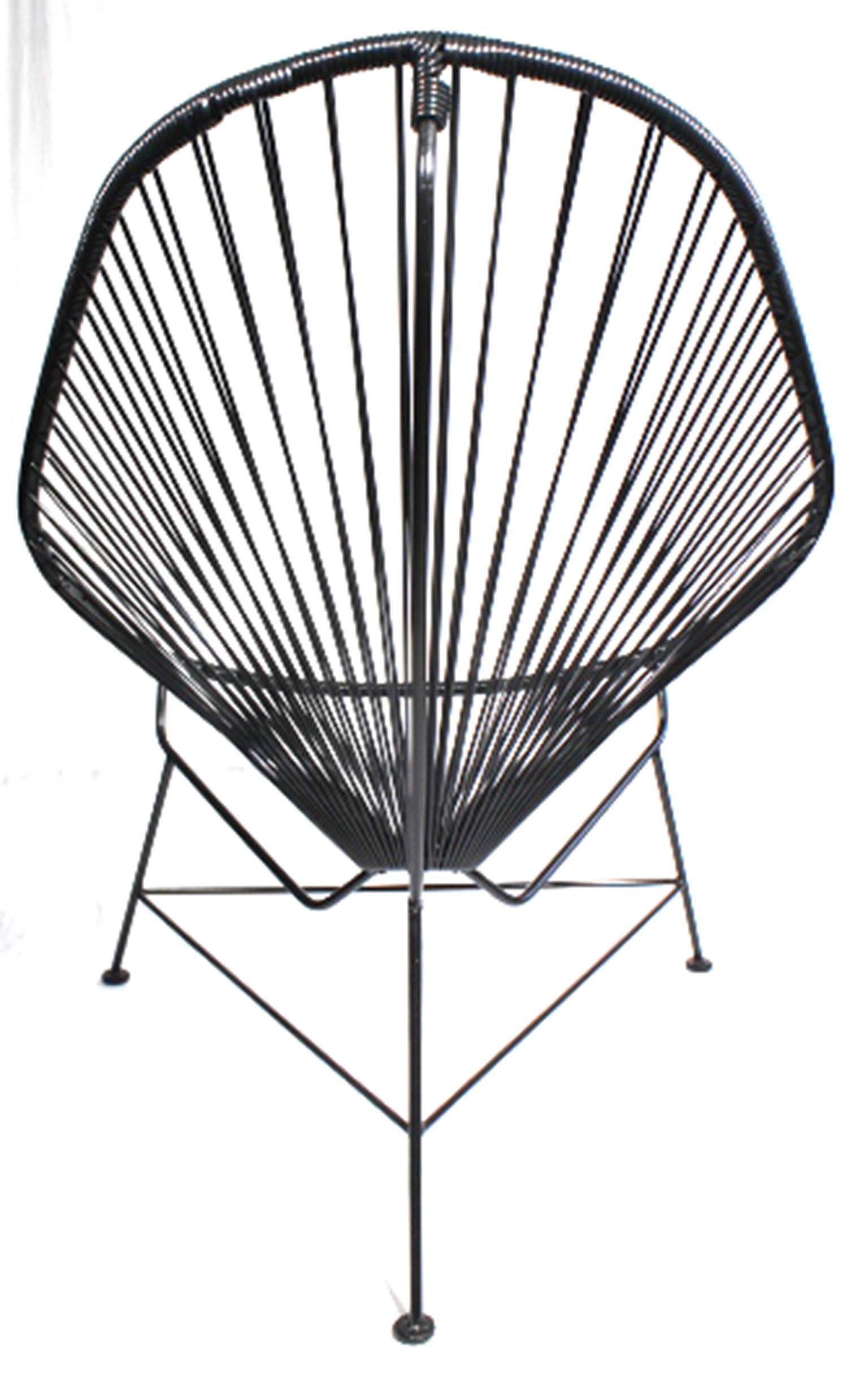 Handmade Acapulco steel frame chair made by a furniture maker in San Francisco.

 Galvanized steel chair.
 Tripod base.
 Features a pear shaped frame.
 Black woven vinyl cord seat.
 

Material: Steel and vinyl.