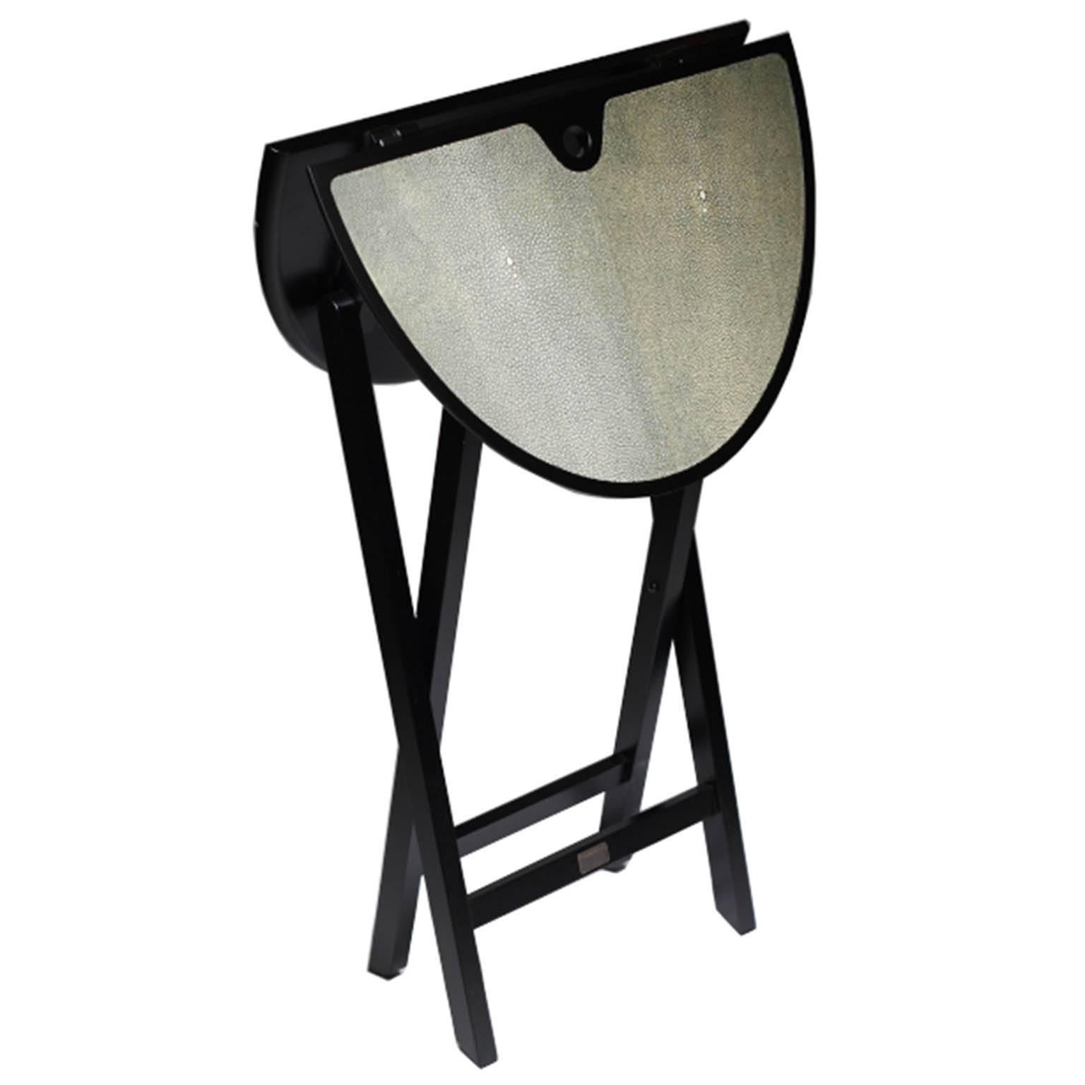 Folding small table. Structure in matte black, top covered in Shagreen (stingray skin).