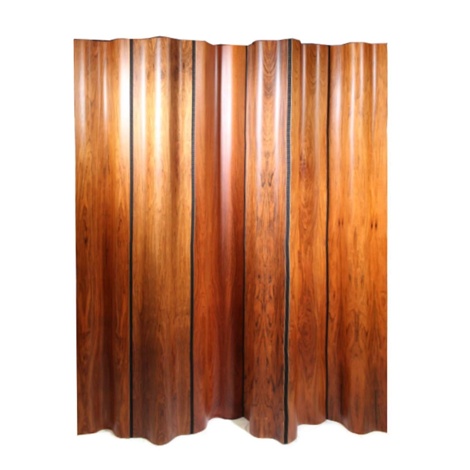 Bentwood six panel rosewood room divider. Special edition, this is number 203 of 500 that Herman Miller produced in 1992 when a buried stockpile of old growth Brazilian rosewood was discovered at the Herman Miller manufacturing plant. Signed as