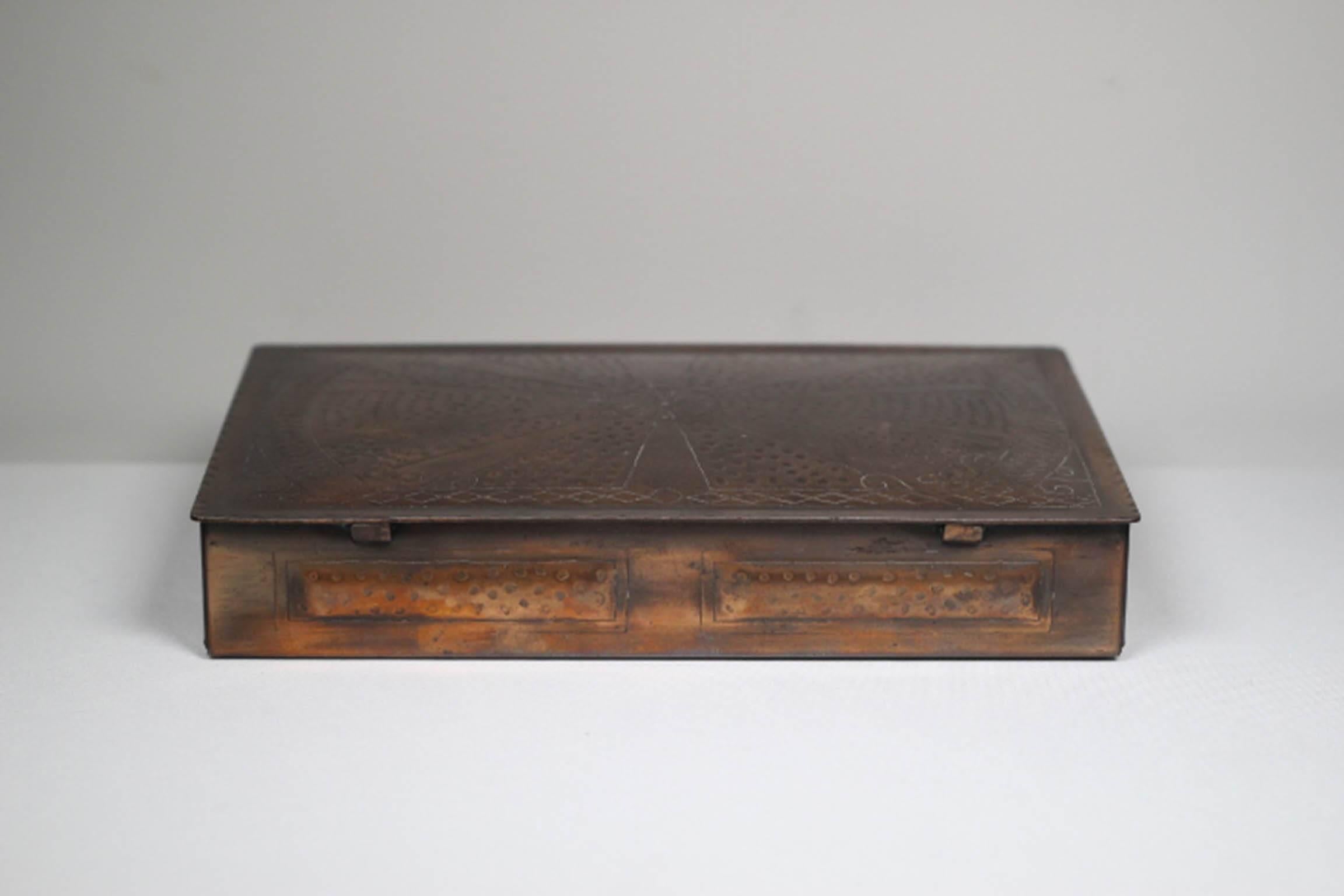 Copper-plated box lined with sandlewood.