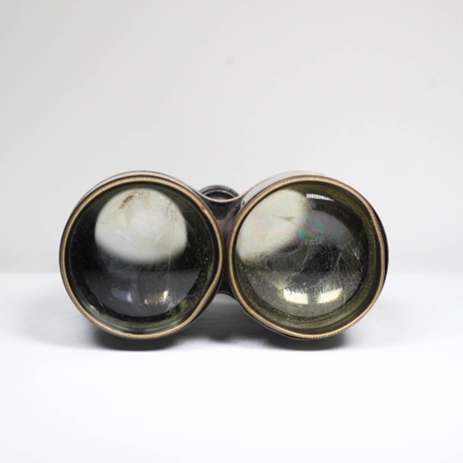 Antique brass binoculars in good working order by G. Falconer and Co. Hong Kong, circa 1800s.