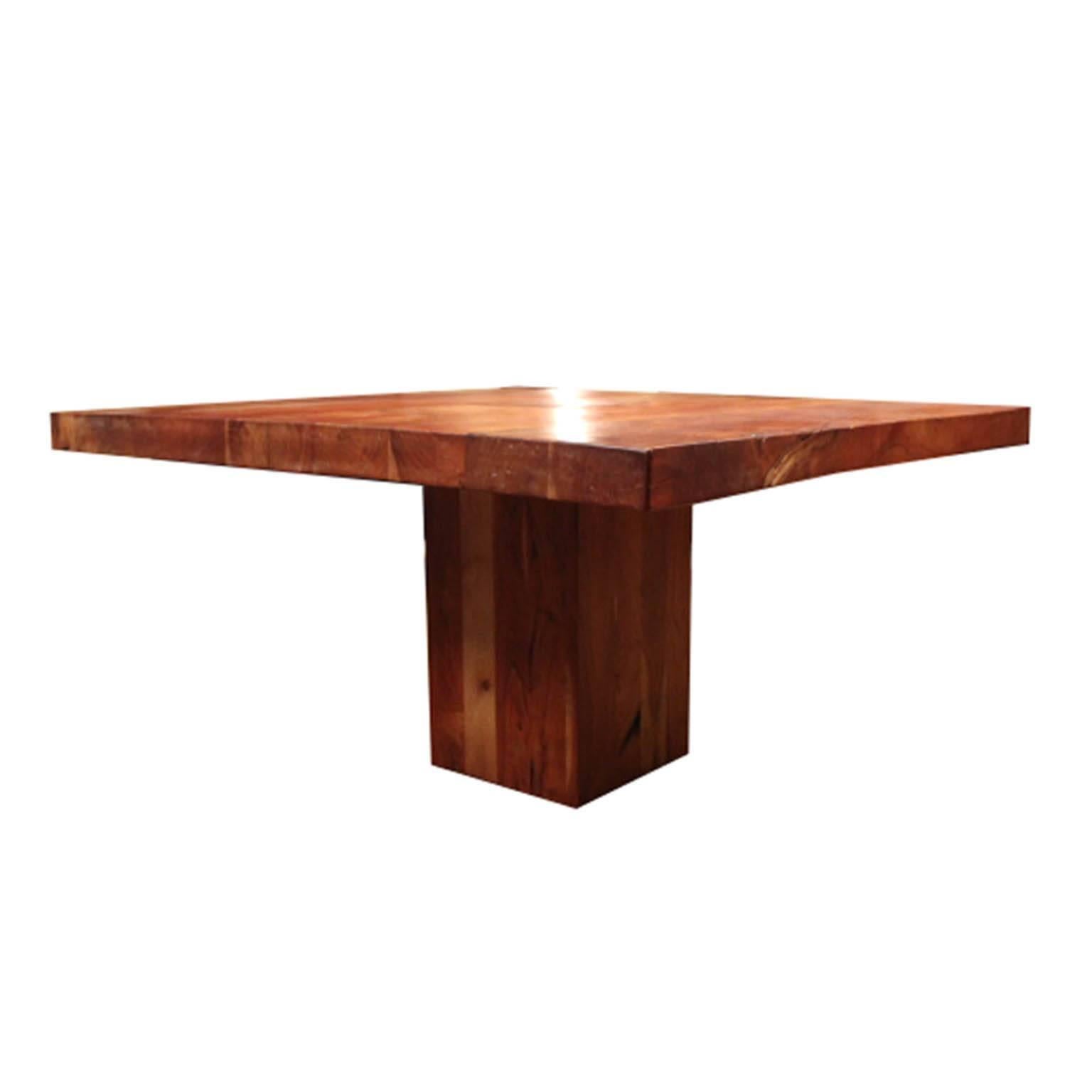 Custom solid cherry square dining table with walnut butterfly joints. The top has a square cutout that rests on a solid center piece.
Custom-made by Jaxon Home Furnishings.
