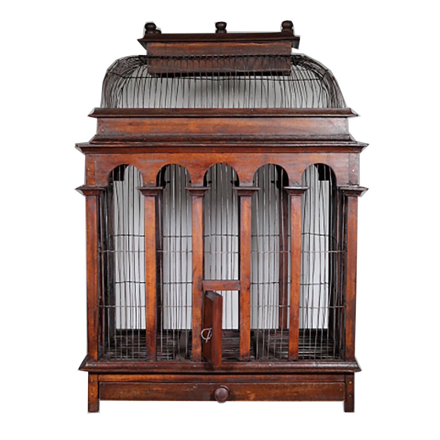 Wood and wire birdcage with front door, slide out bottom tray and removable top wire dome.