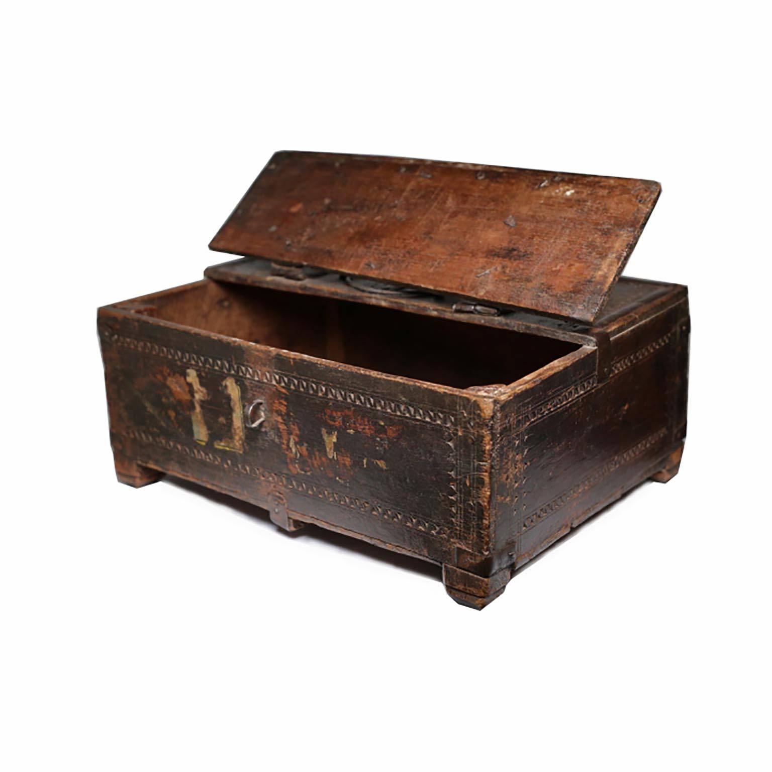 Latched and hinged wooden document box with metal accents that light opens from the top. Rajasthan, India, circa 1800s.