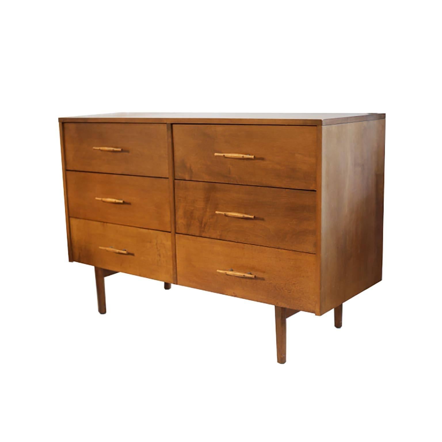 Teak six-drawer dresser with beautiful carved pulls by Paul McCobb Planner Group.